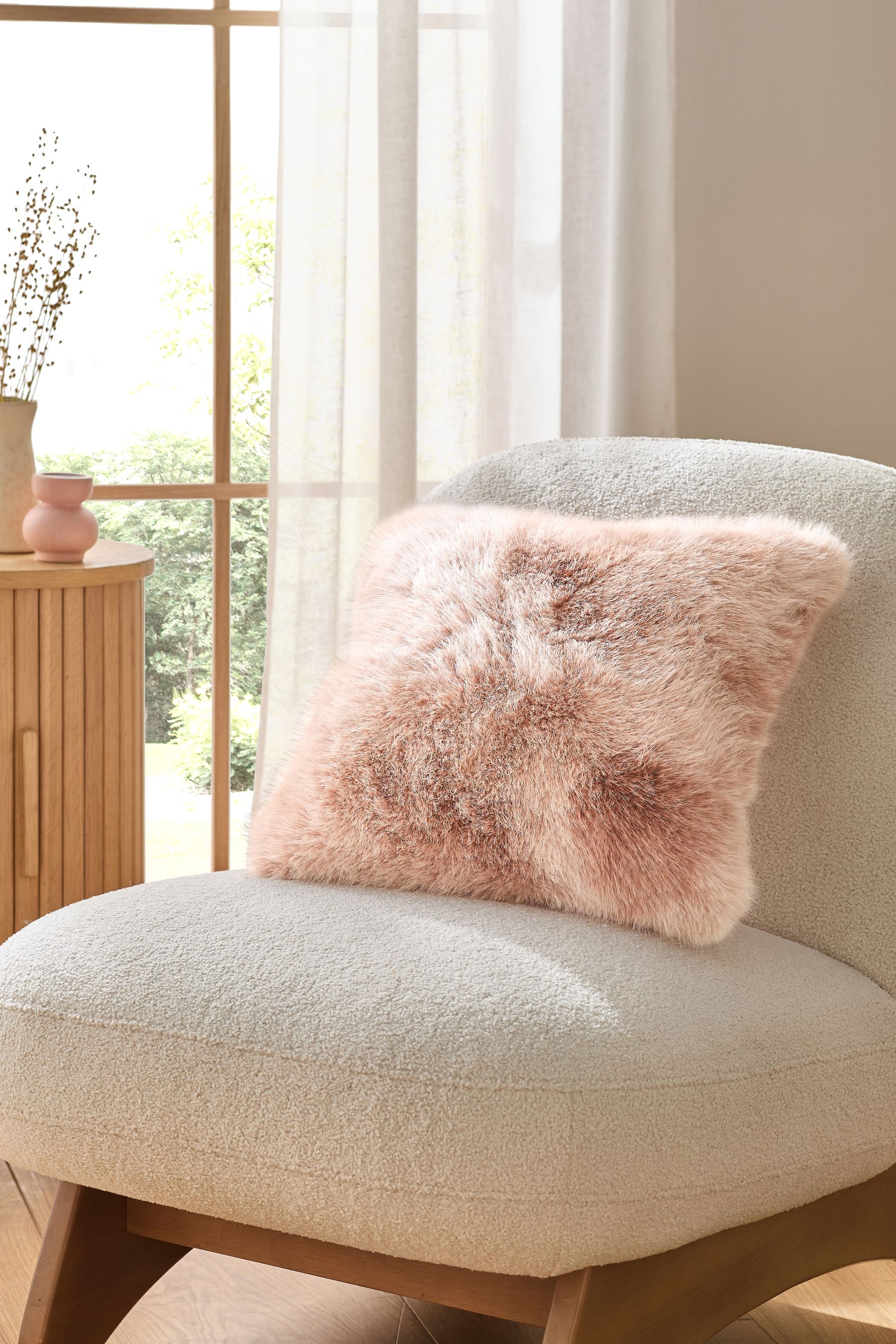 Faux fur pink cushion shop