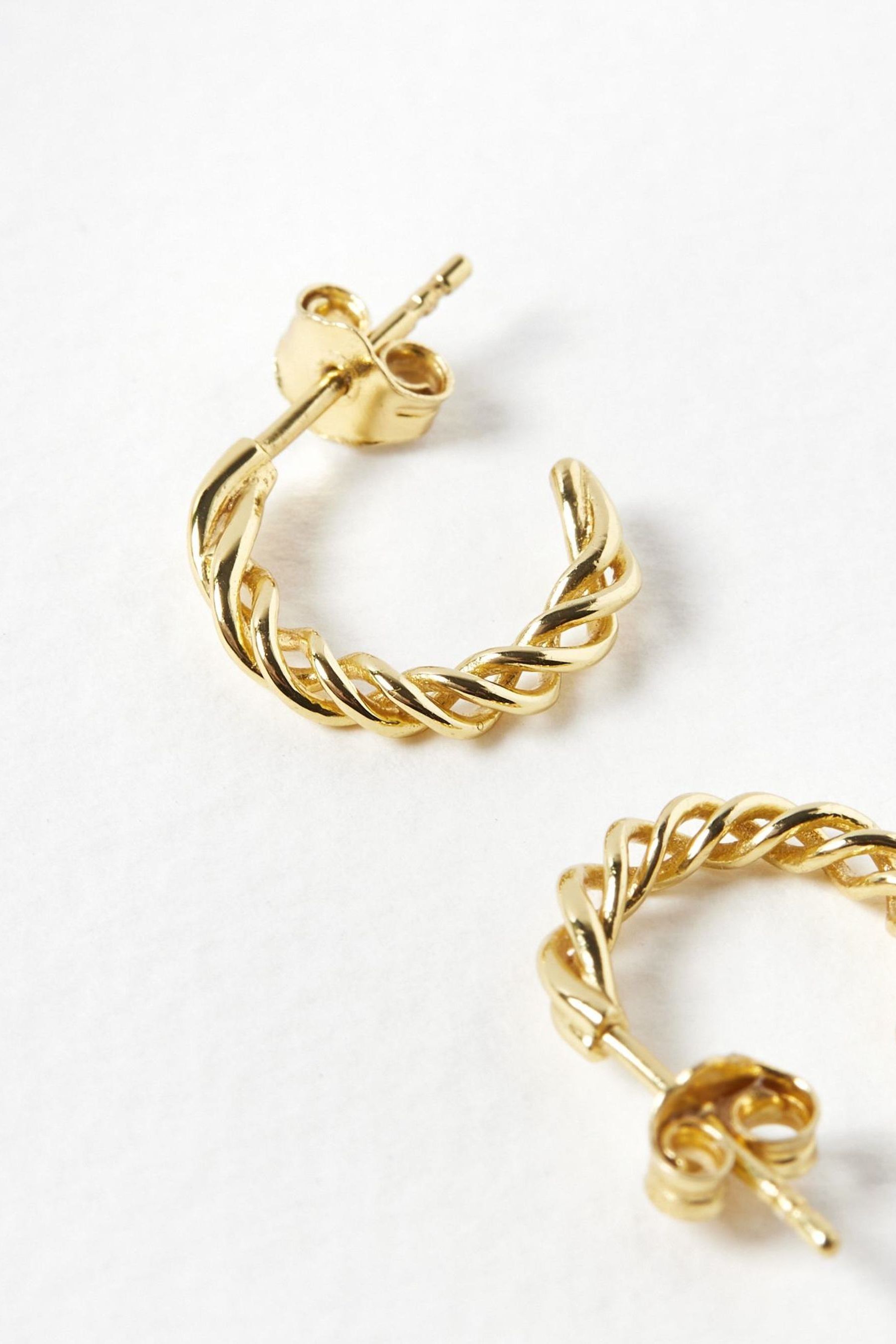 Buy Oliver Bonas Gold Plated Hoku Twisted Hoop Earrings from the Next UK online shop