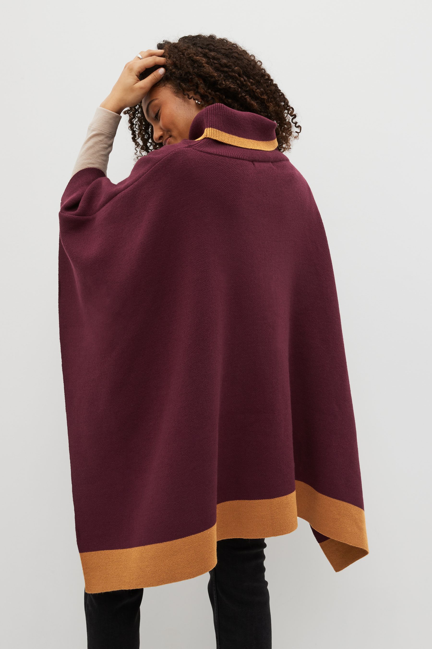 Poncho jumper next on sale