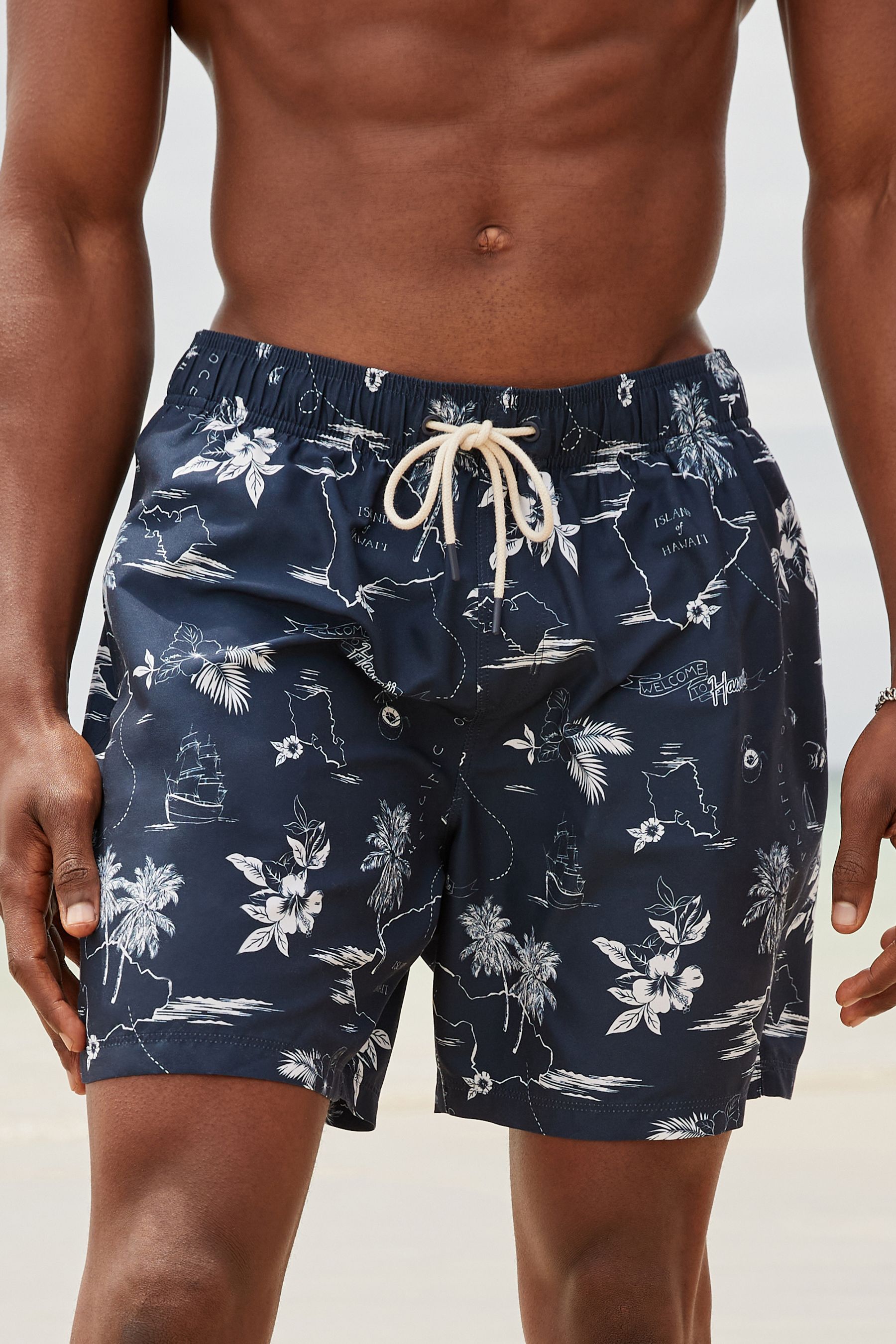 Buy Navy Blue Hawaiian Relaxed Fit Printed Swim Shorts from the Next UK online shop
