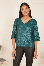 Yumi Green Sequin Top With Fluted Sleeve - Image 1 of 5