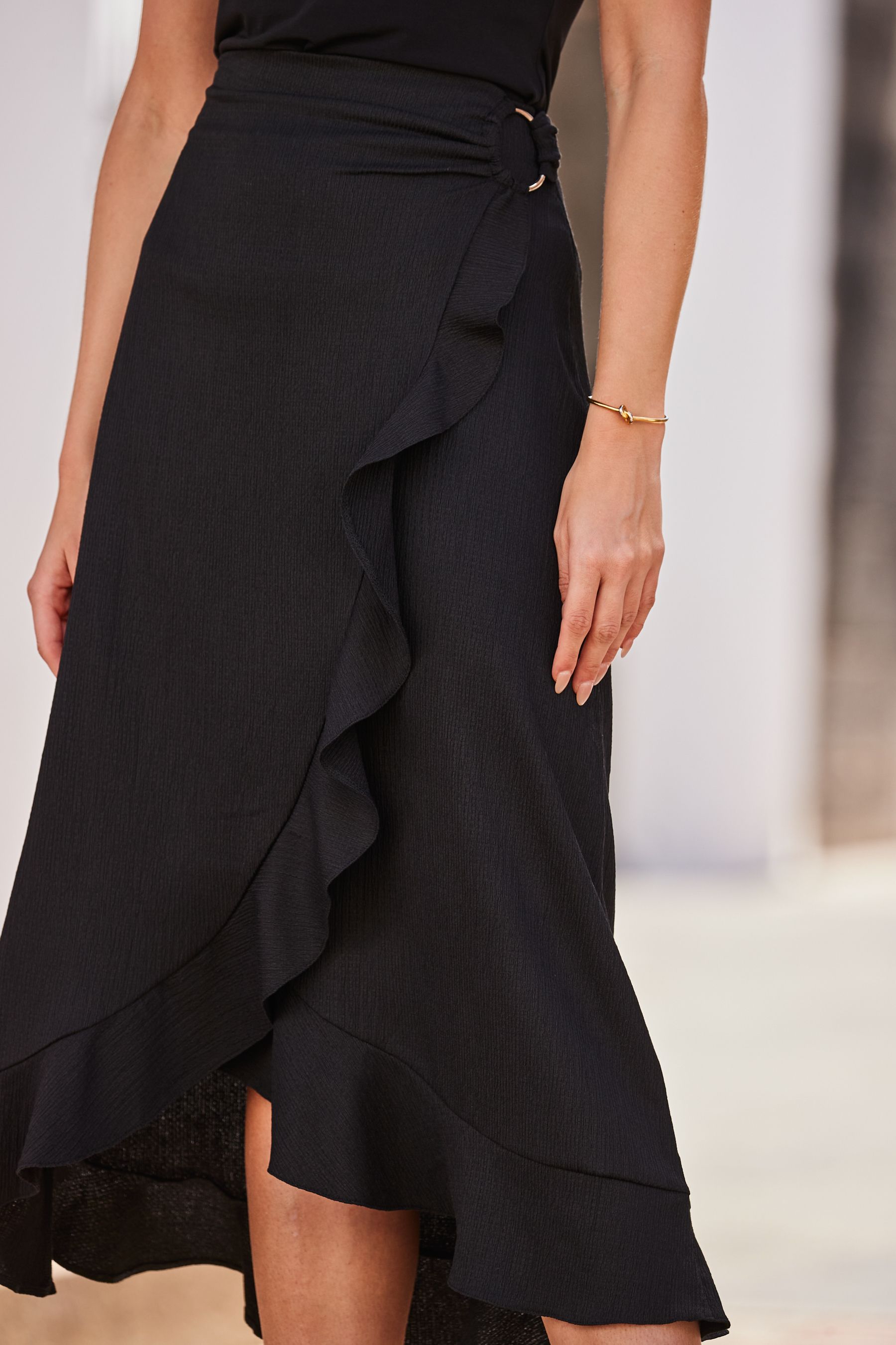 Black ruffle wrap on sale skirt