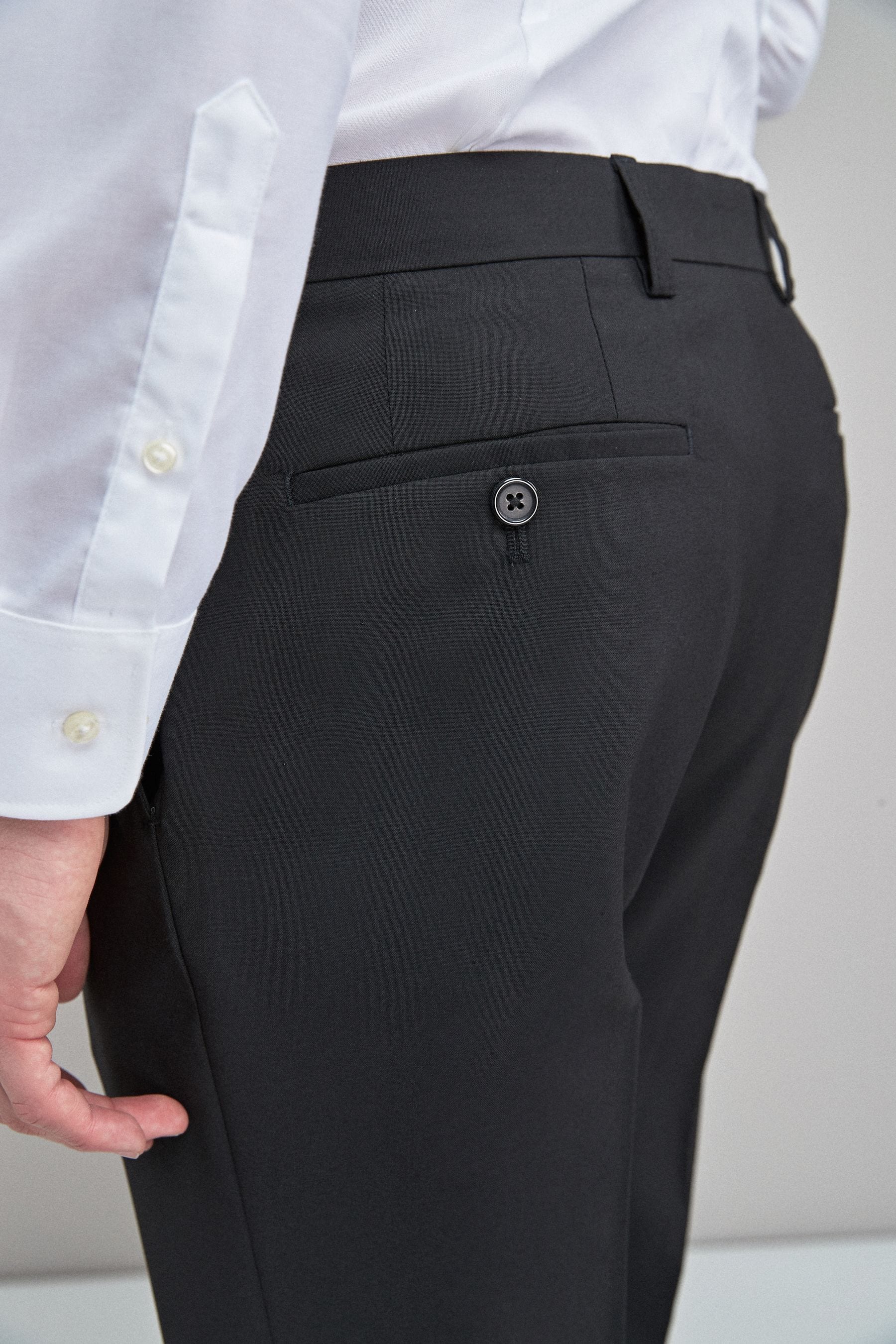 Buy Black Slim Fit Stretch Smart Trousers from the Next UK online shop