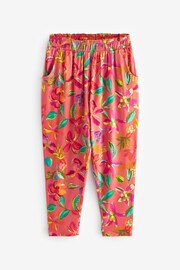 Rust Orange/ Pink Tropical Flower Print Jersey Stretch Lightweight Trousers (3-16yrs) - Image 6 of 8