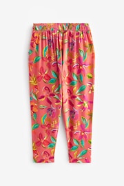 Rust Orange/ Pink Tropical Flower Print Jersey Stretch Lightweight Trousers (3-16yrs) - Image 7 of 8