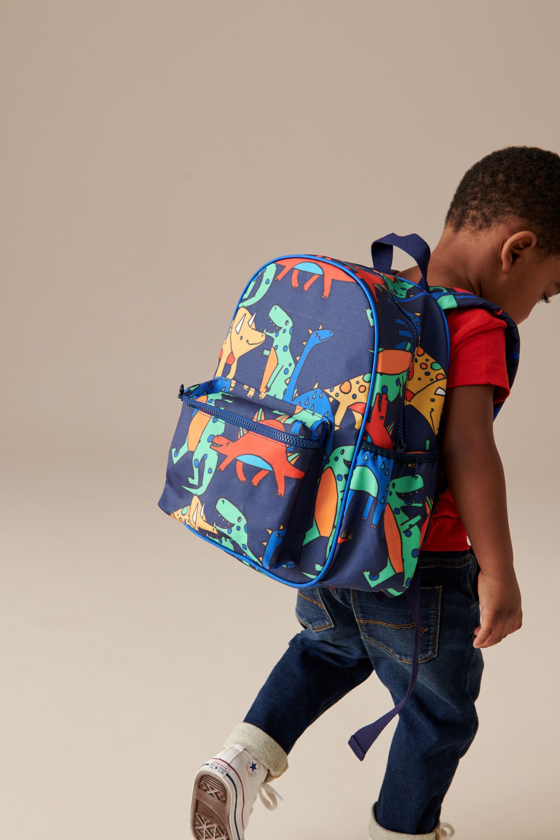 Buy Dinosaur Backpack from Next USA