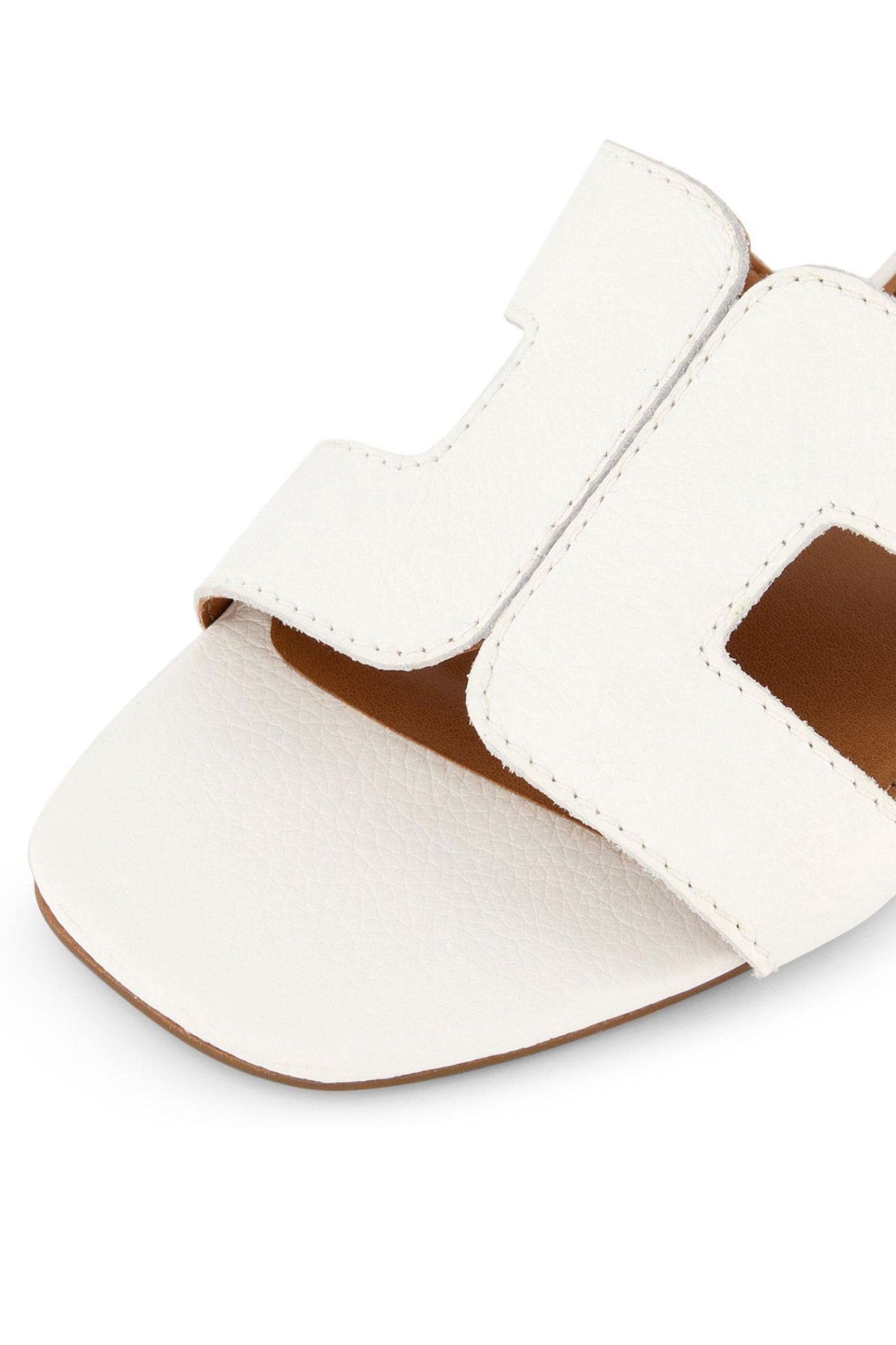 Dune loupe sandals white top