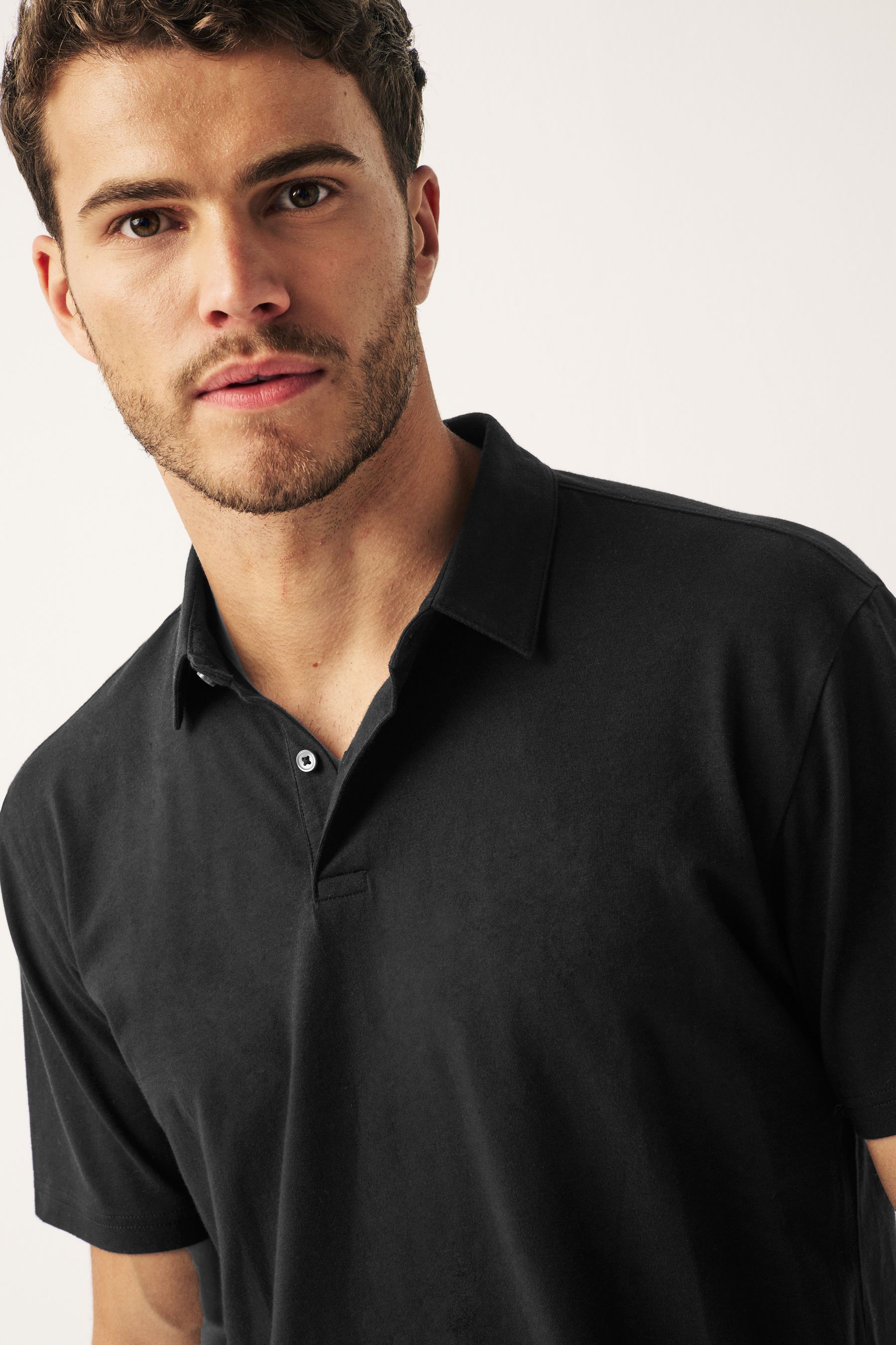 Black polo shirt next discount