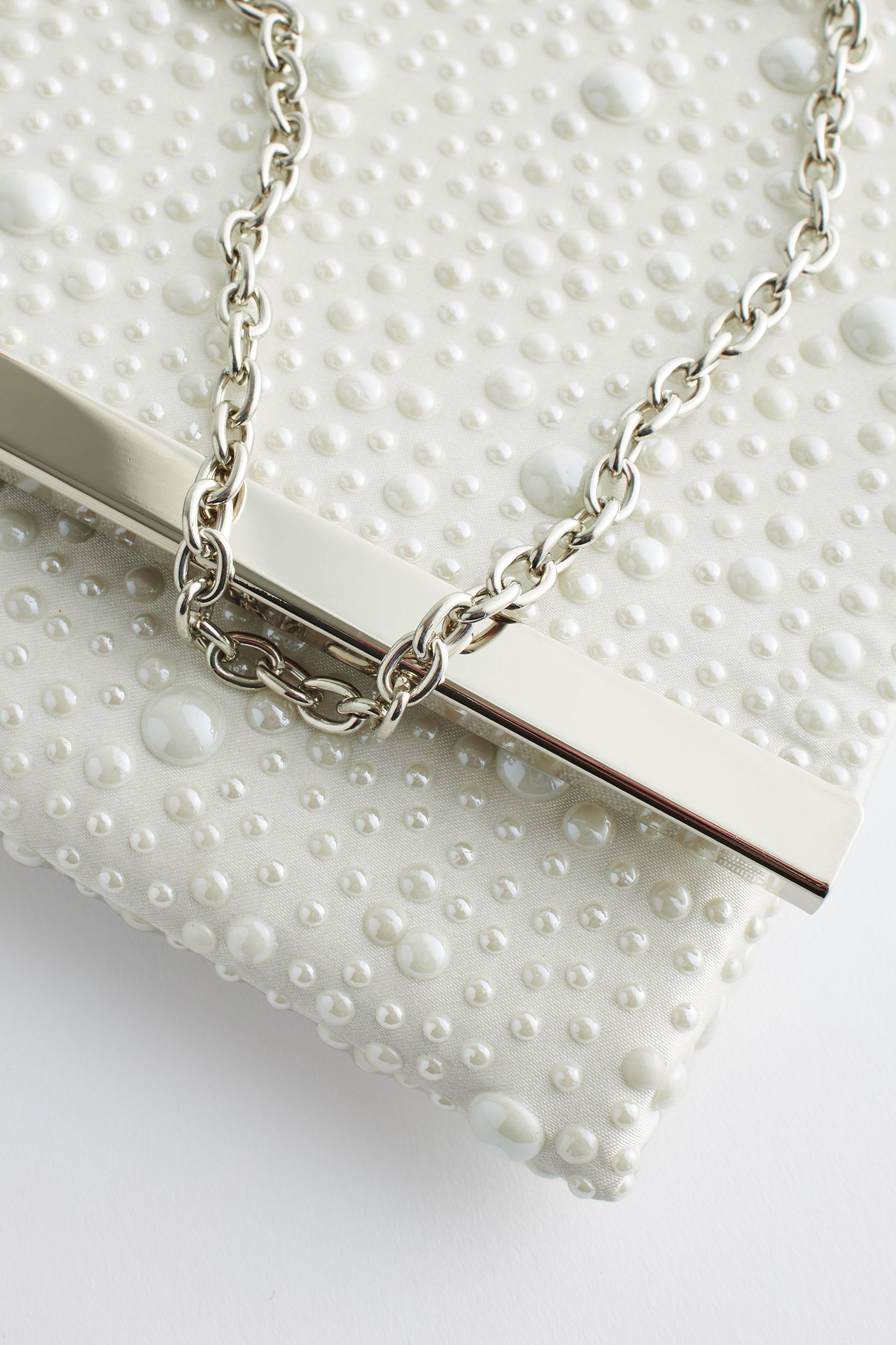 Silver and clearance pearl clutch bag