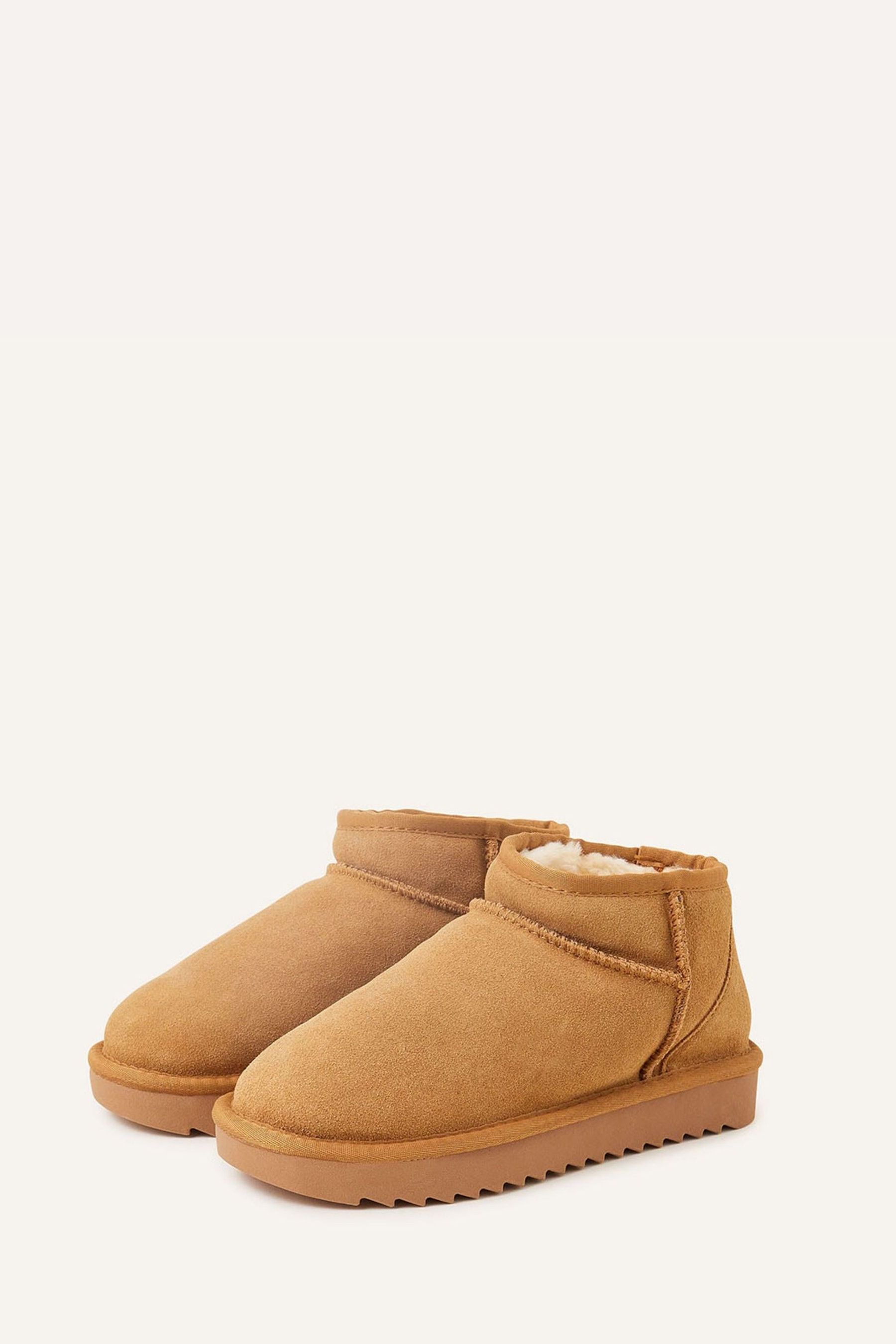 Accessorize boots top
