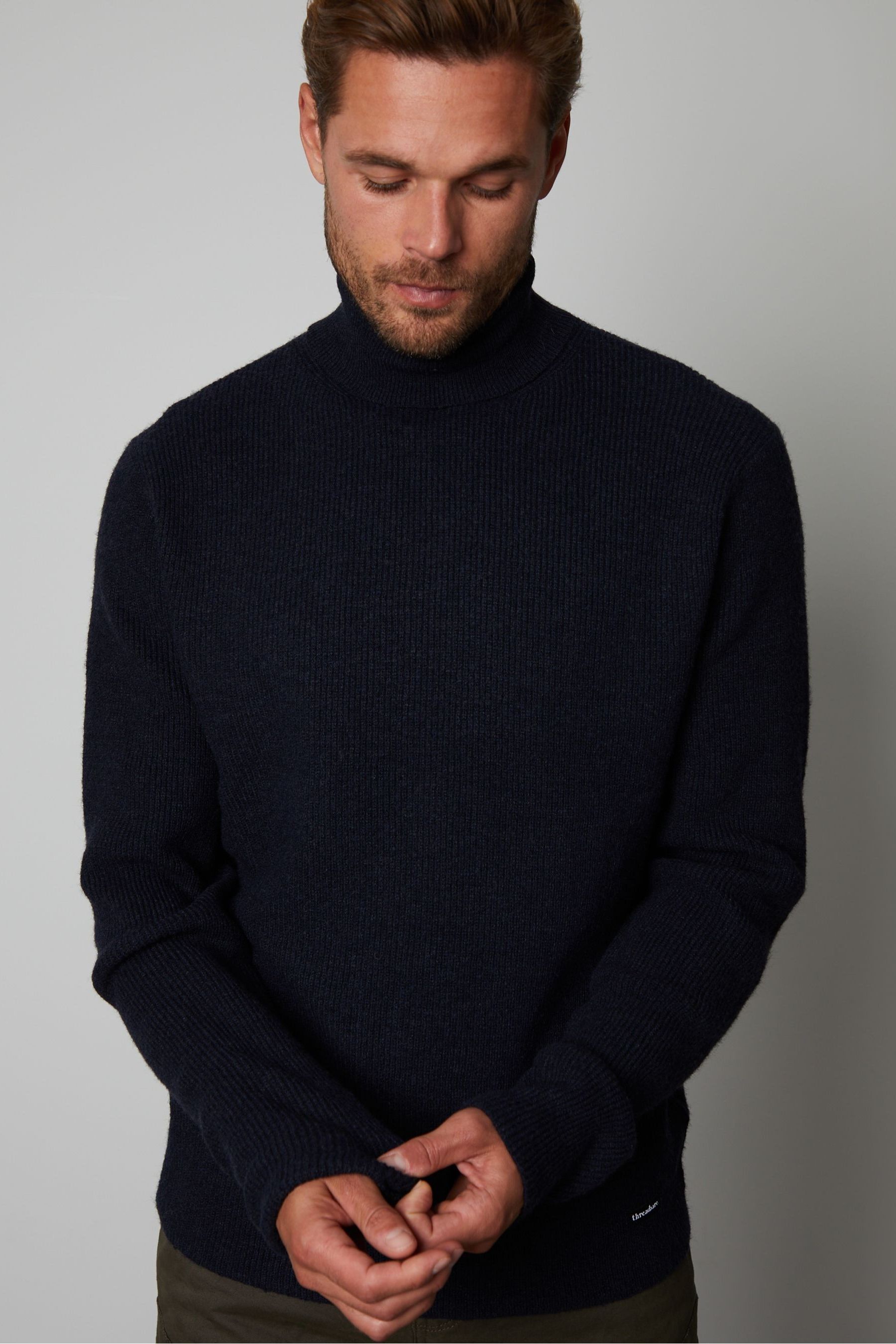 Black roll neck knitted jumper discount