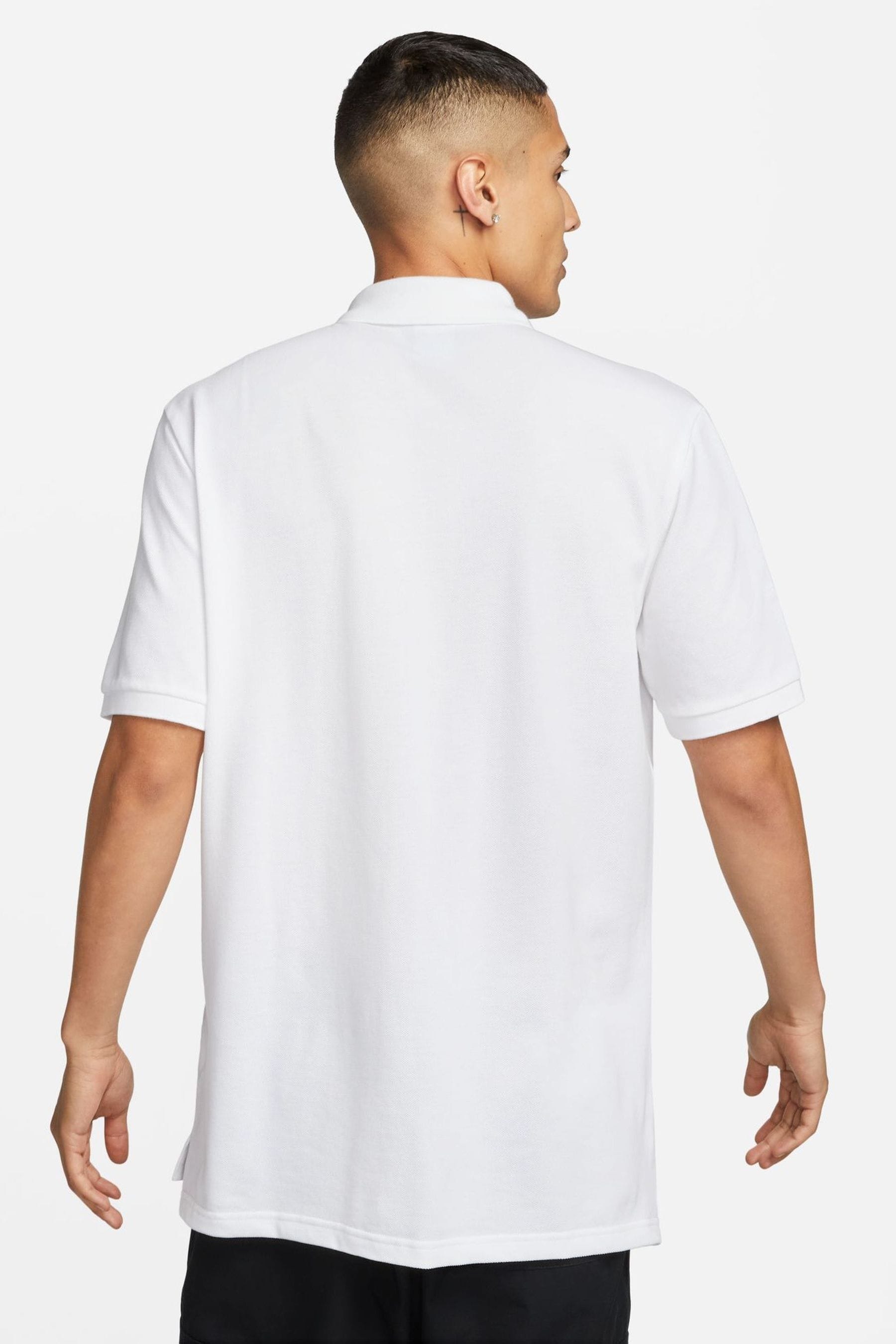 Buy Nike White Sportswear Polo Shirt from the Next UK online shop