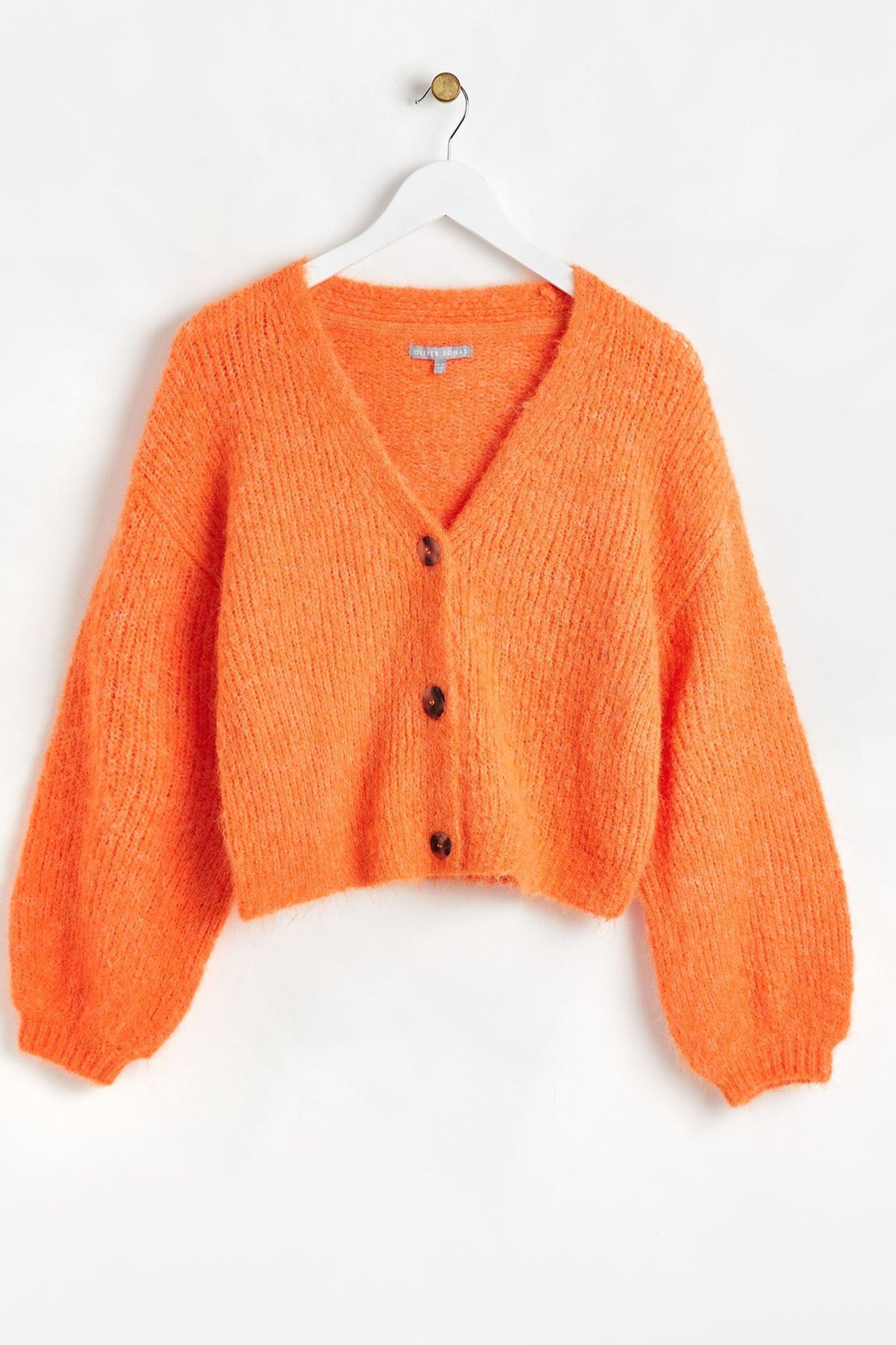 Orange store cardigan next