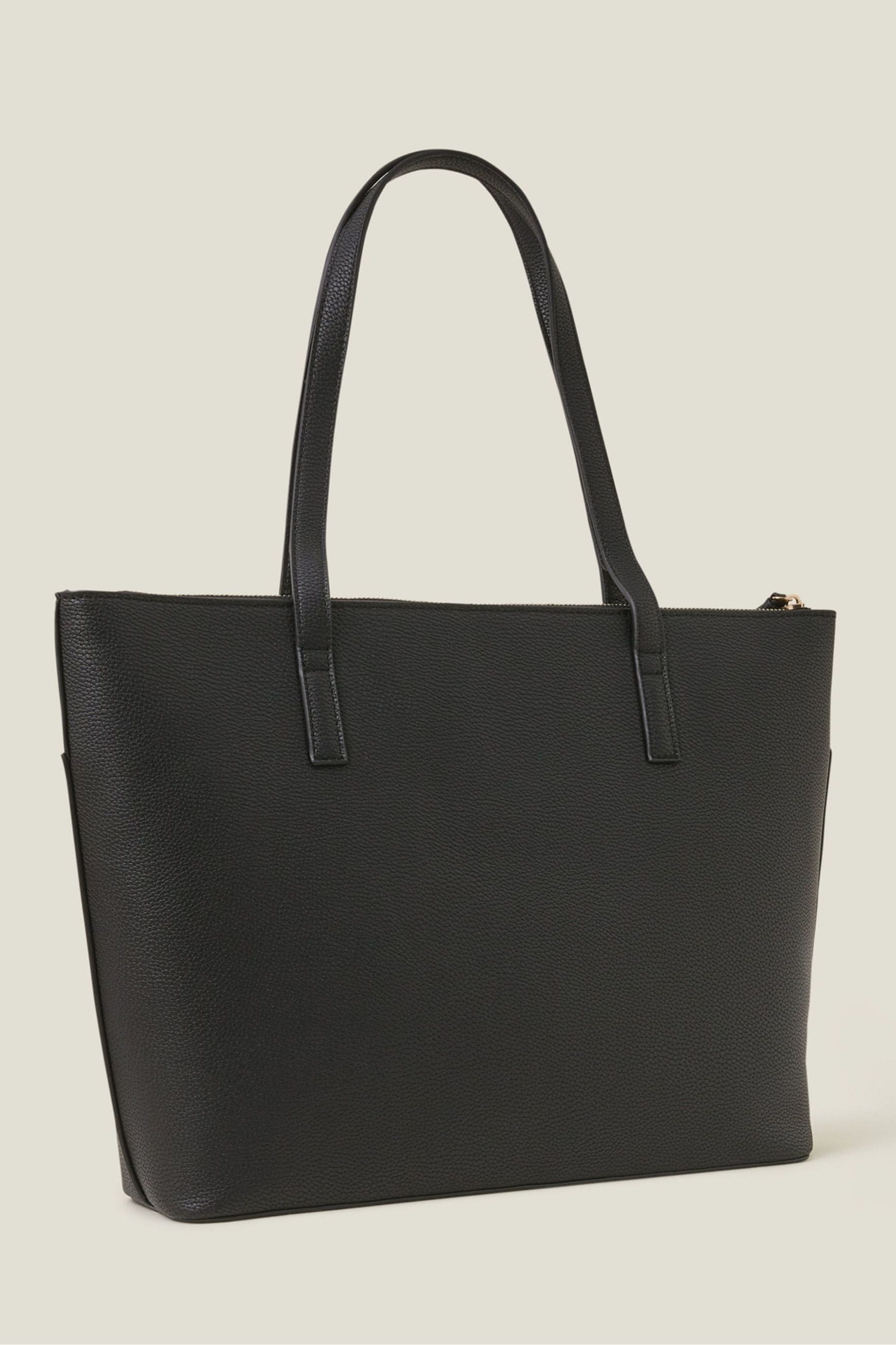 Black tote bag with pockets top