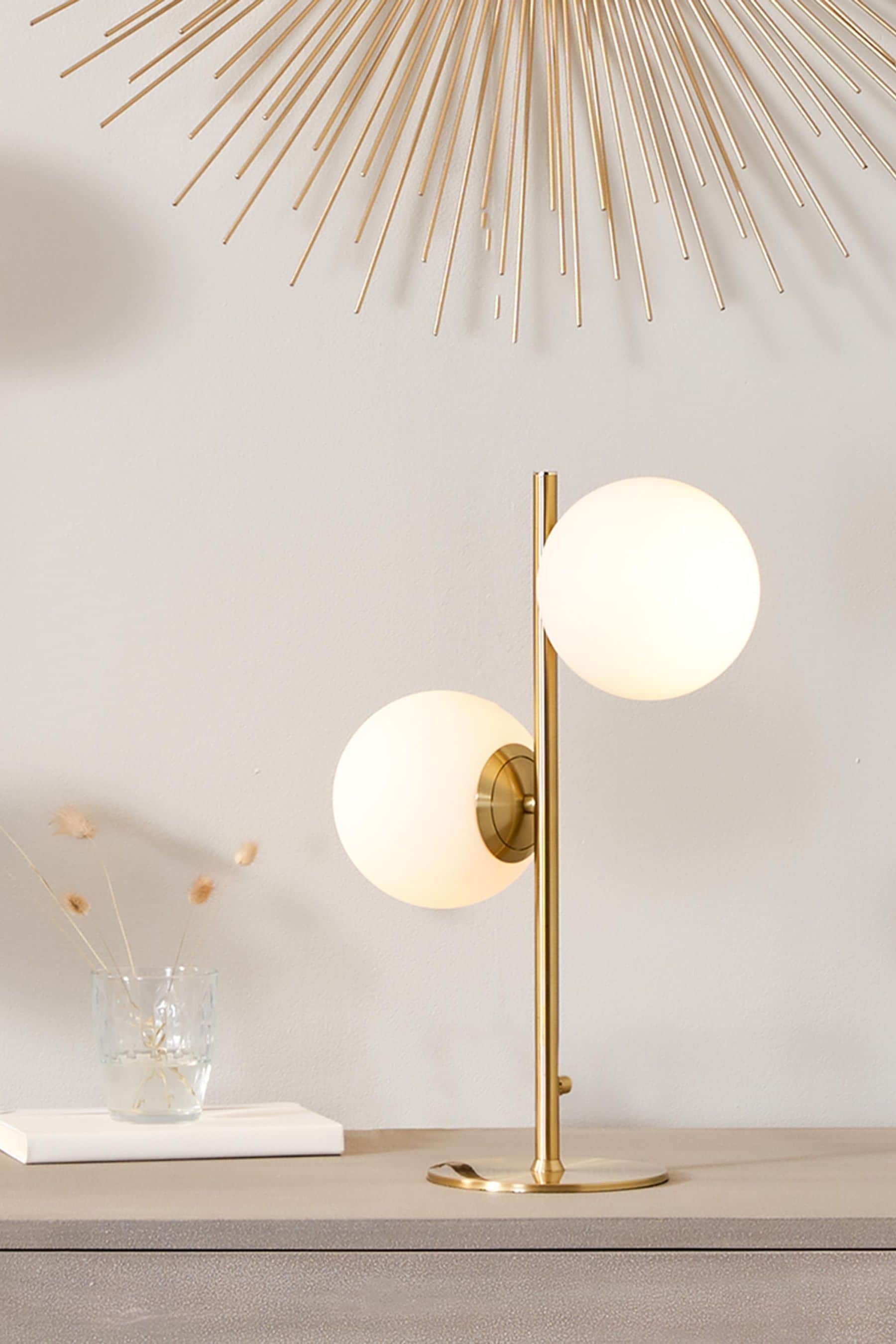 Gold orb floor outlet lamp
