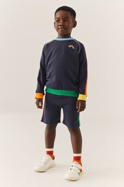 Little Bird by Jools Oliver Navy Rainbow Rainbow Stripe Jersey Shorts - Image 1 of 10