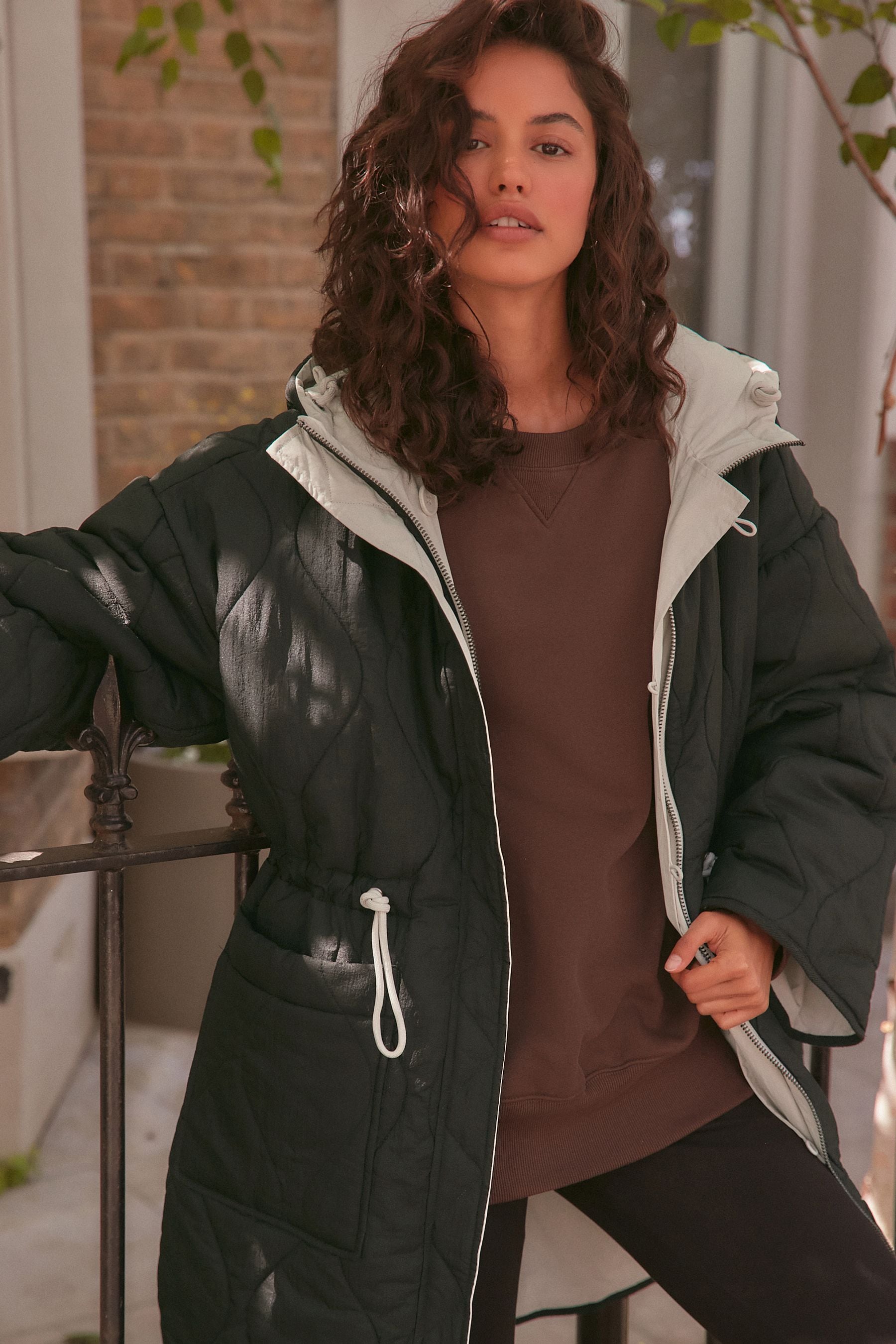 Black Reversible Shower Resistant Hooded Quilted Coat