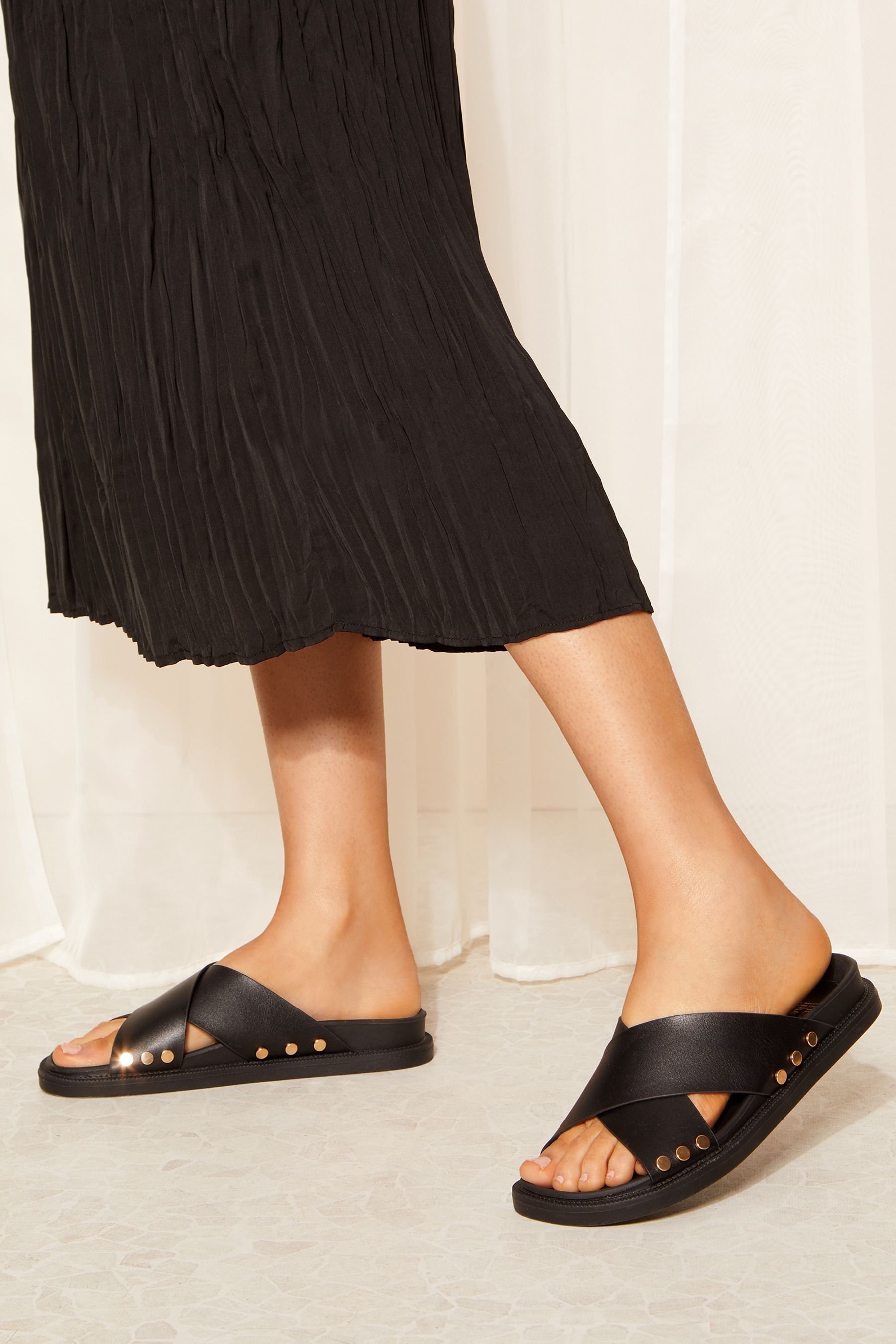 Buy Friends Like These Black Cross Strap Studded Footbed Faux Leather Slider Sandals from Next Luxembourg