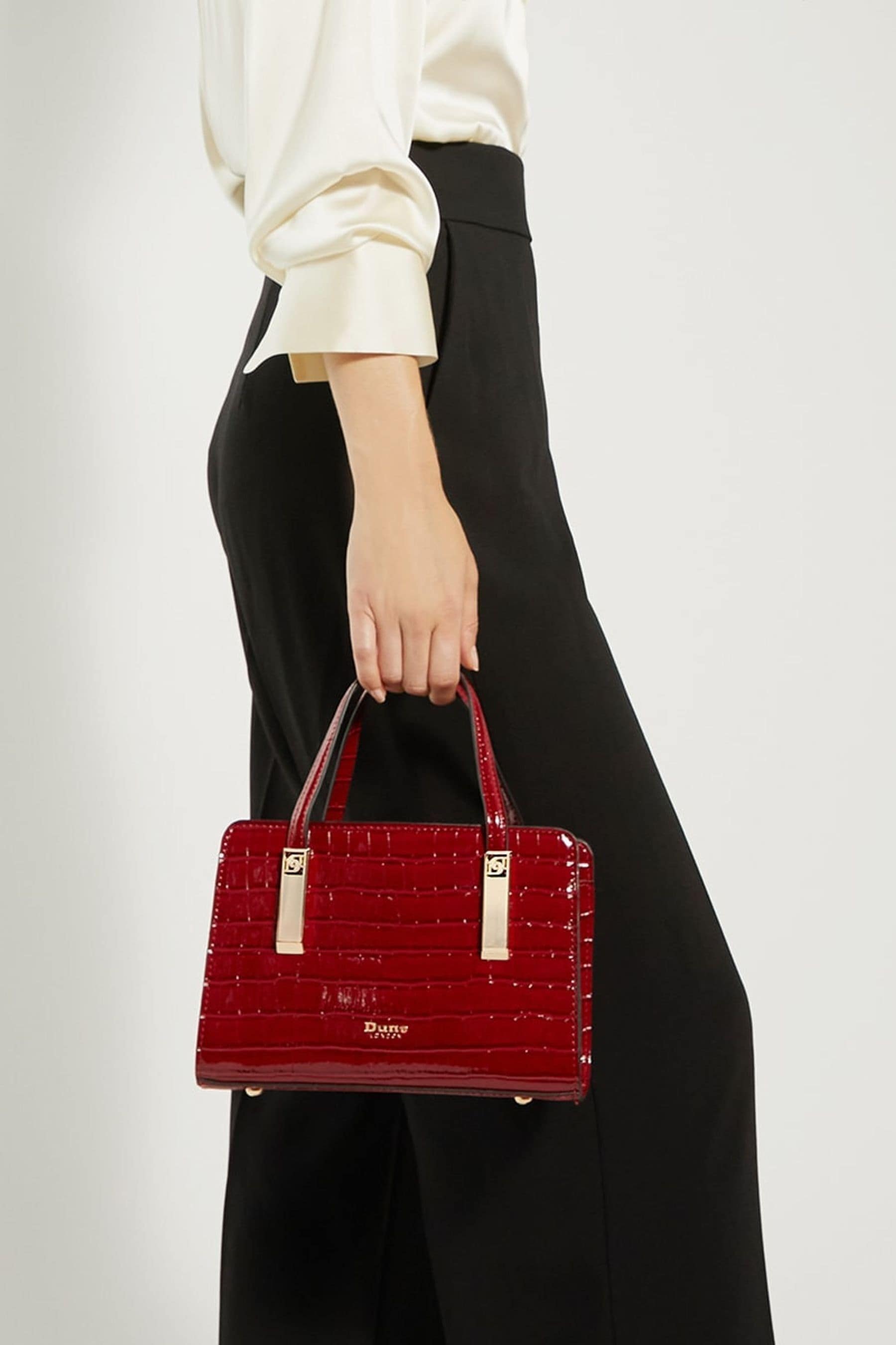 Dune red handbag store