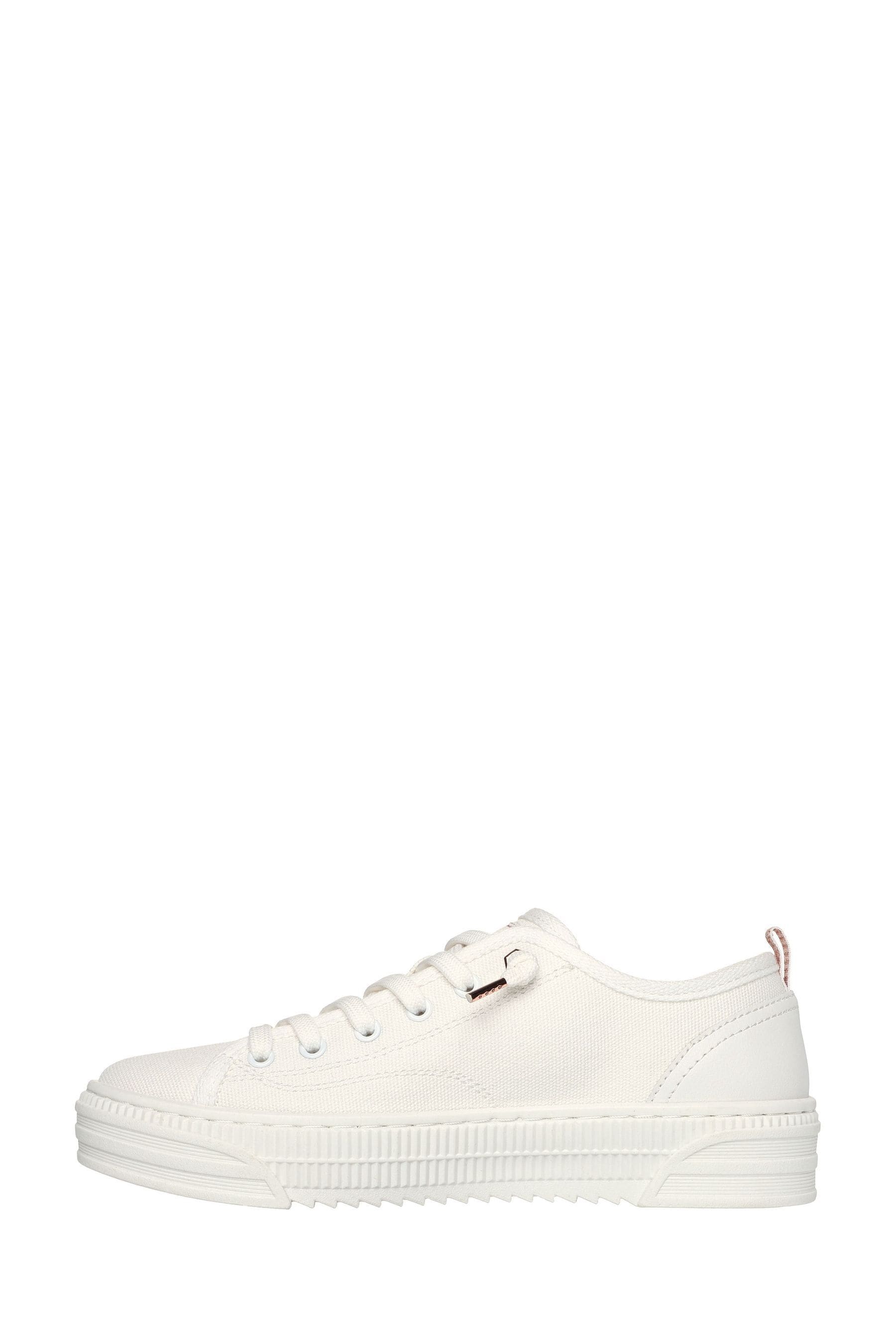 Cream skechers sales