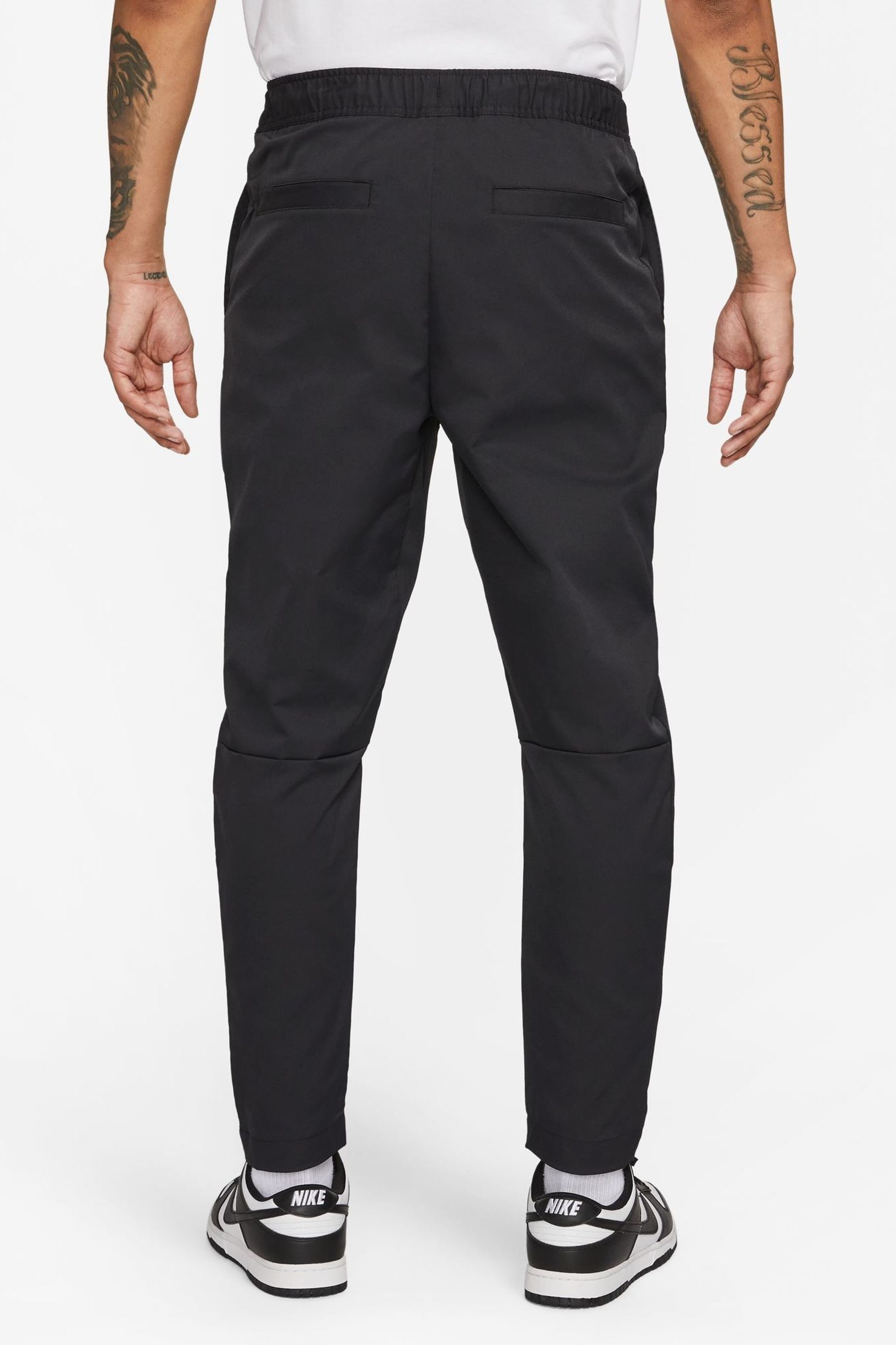 Buy Nike Black Club Woven Tapered Leg Joggers from the Next UK online shop