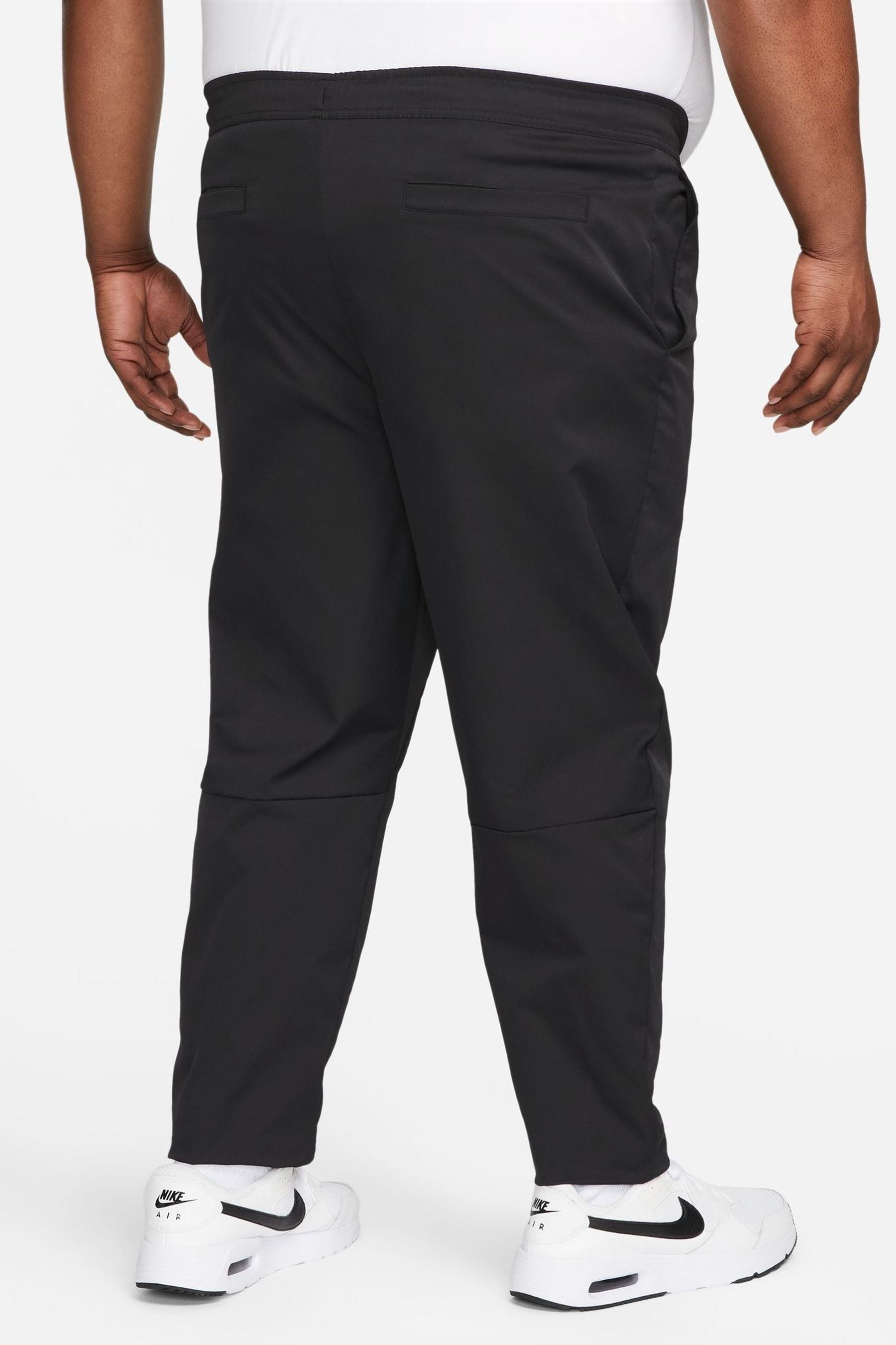Nike woven tapered pants shop