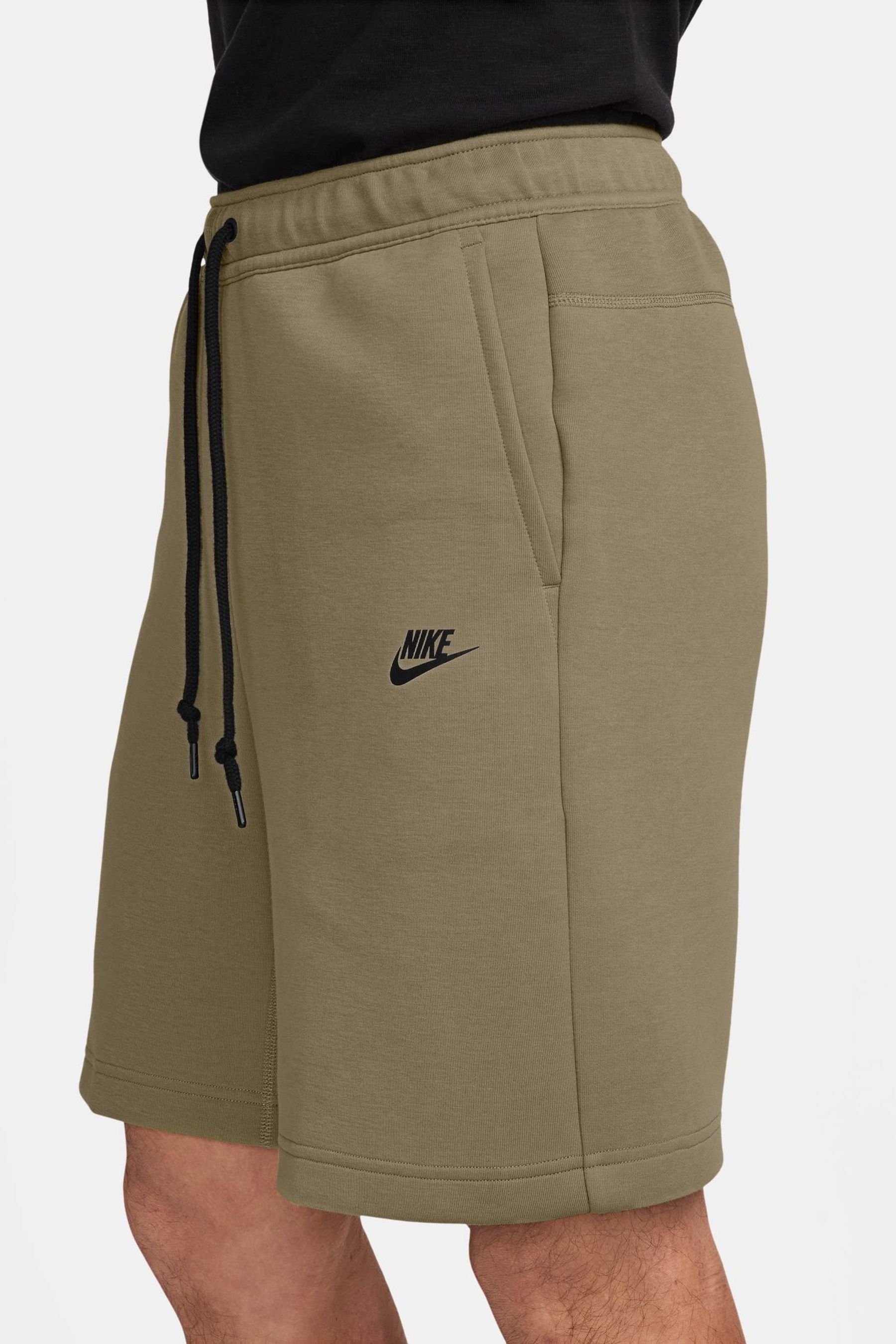 Buy Nike Neutral Olive Tech Fleece Shorts from Next Malta