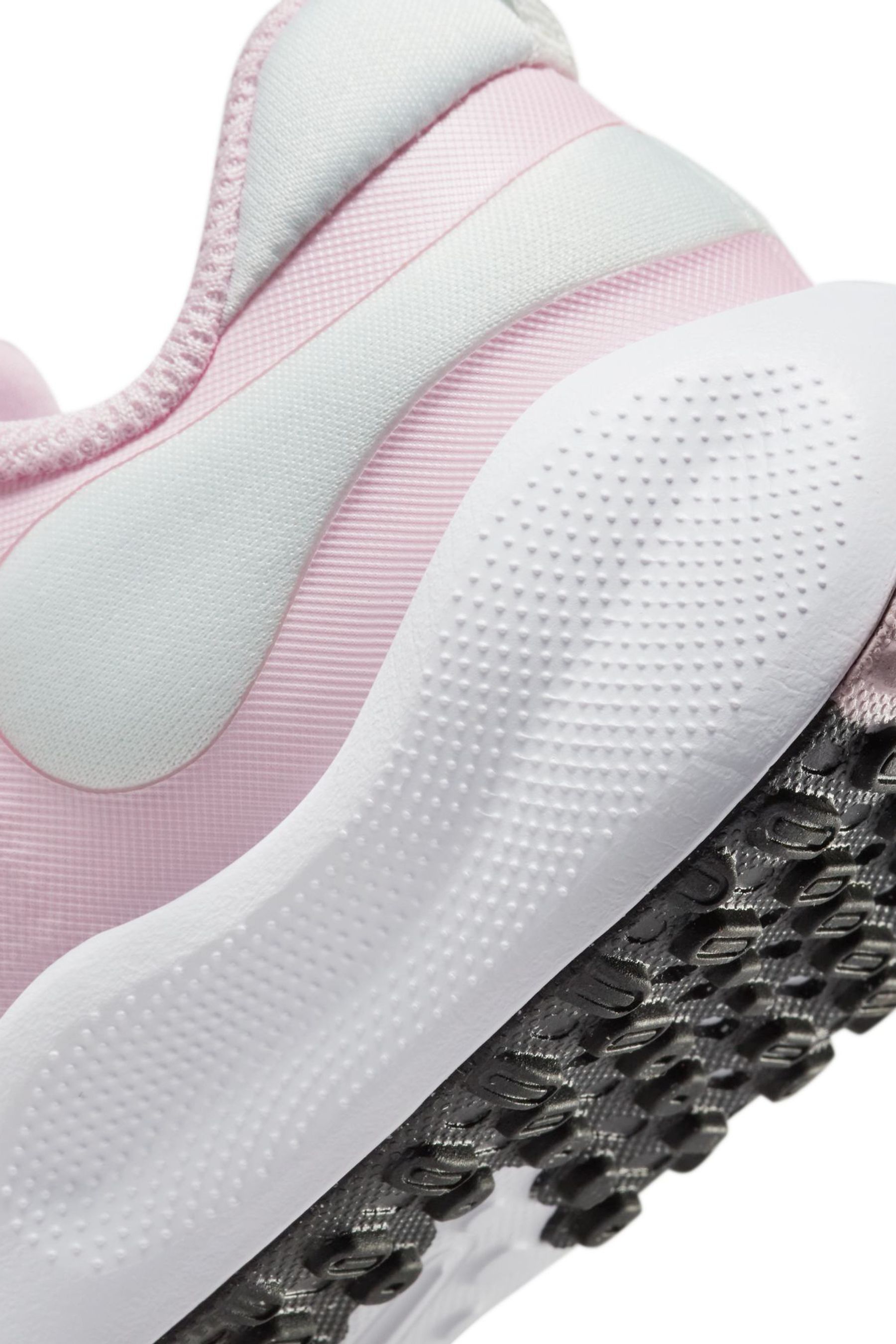 Junior pink nike trainers store