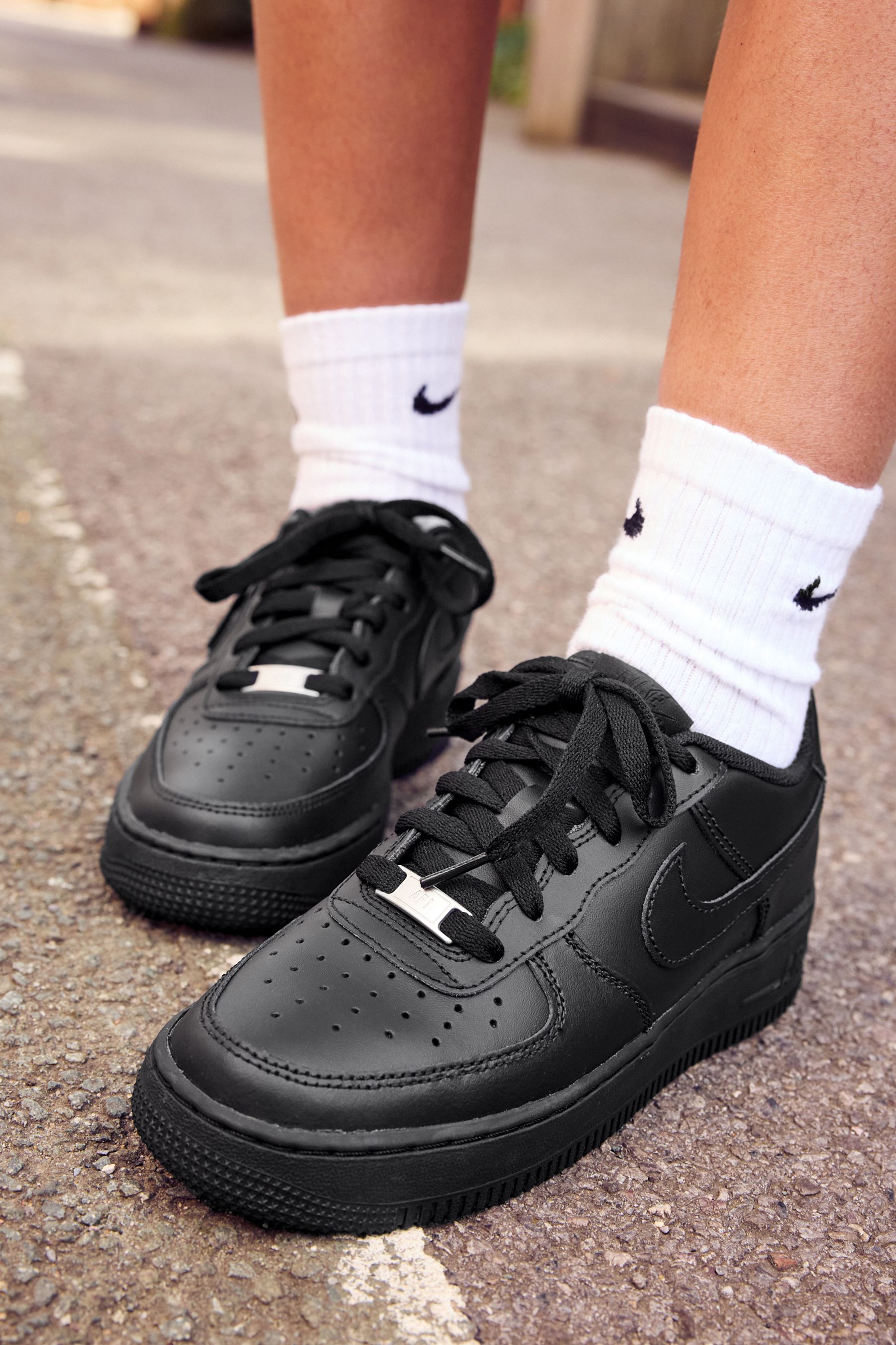 Buy Nike Black Air Force 1 Youth Trainers from the Next UK online shop