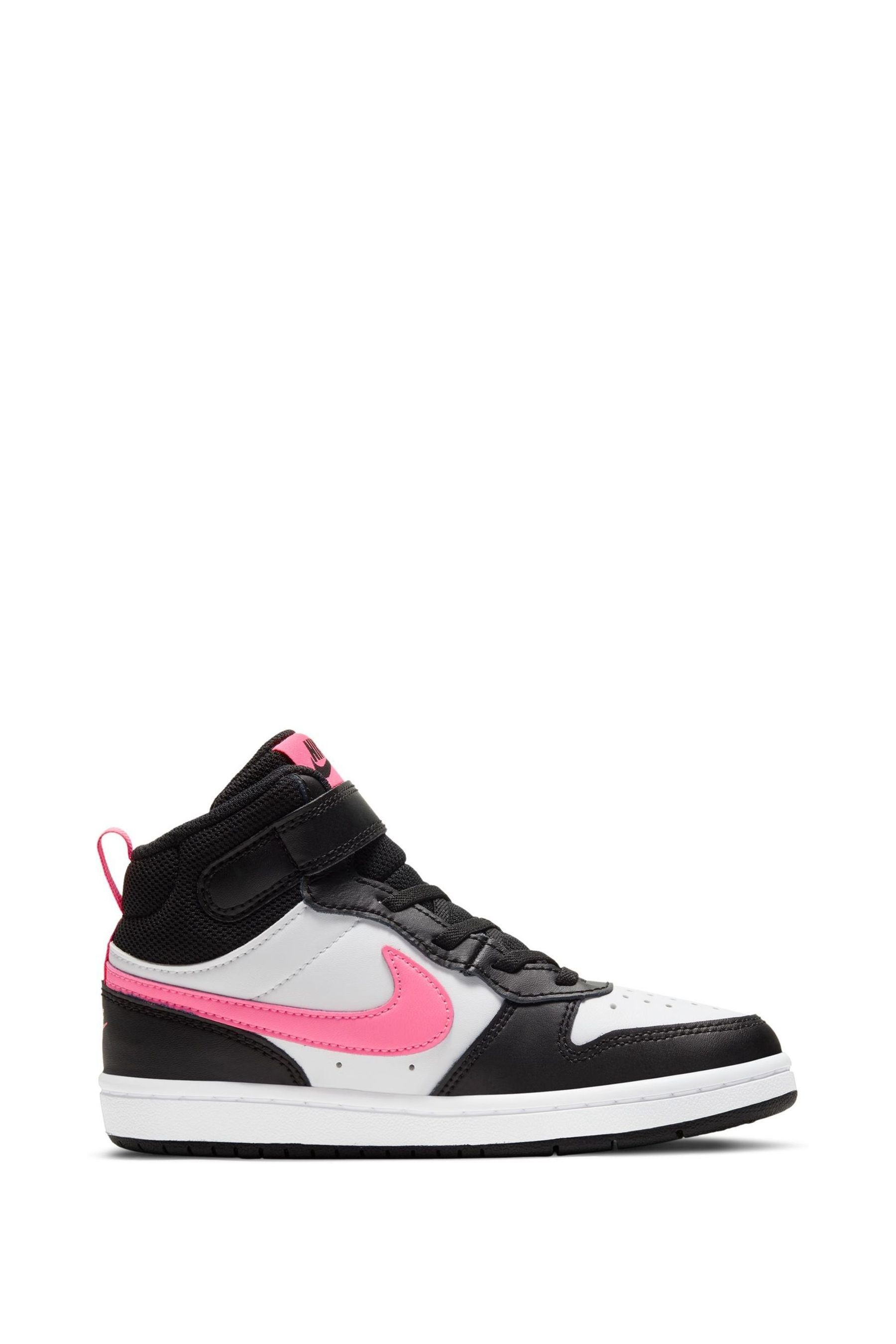 Pink and black nike high tops top