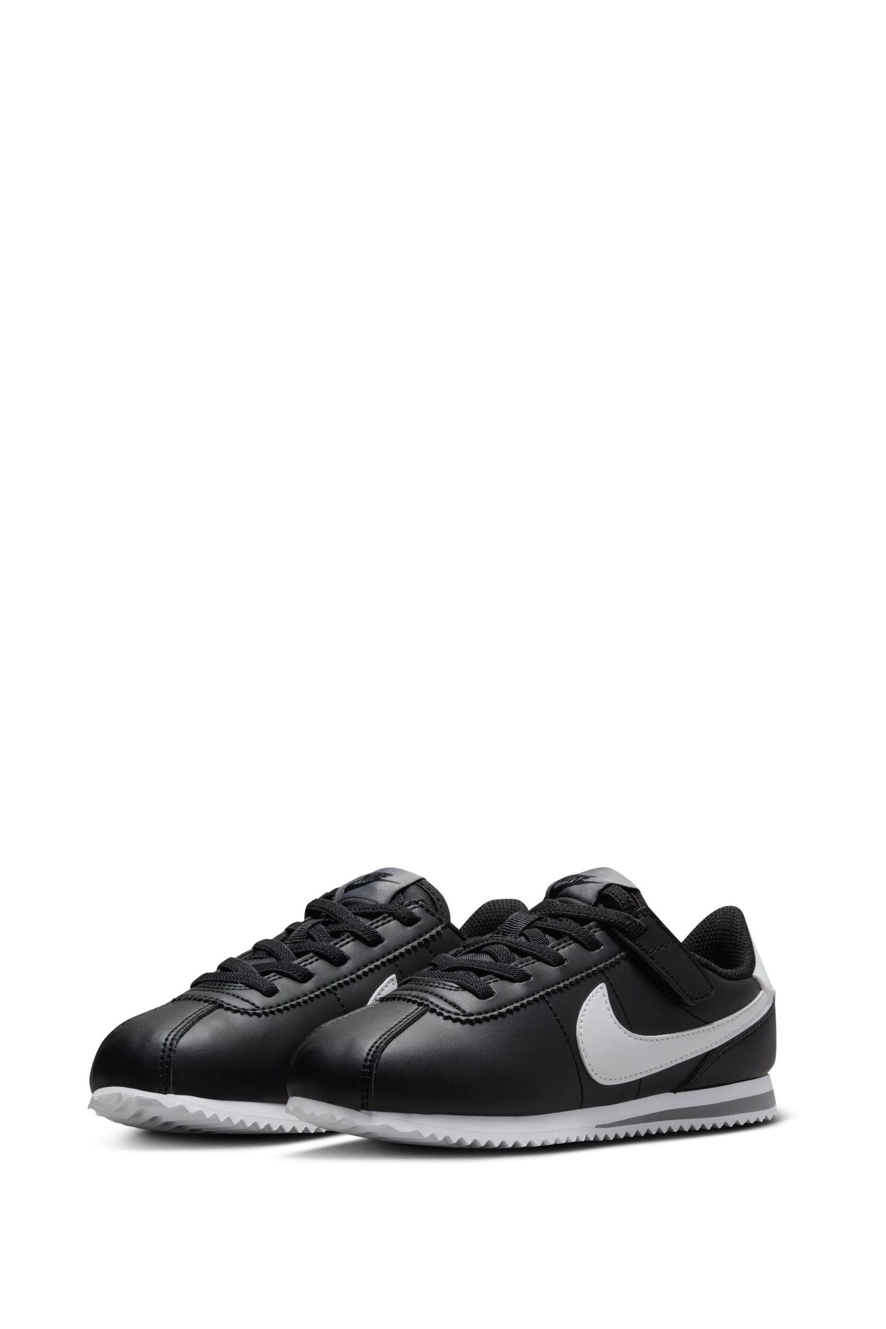 Black nike cortez junior best sale