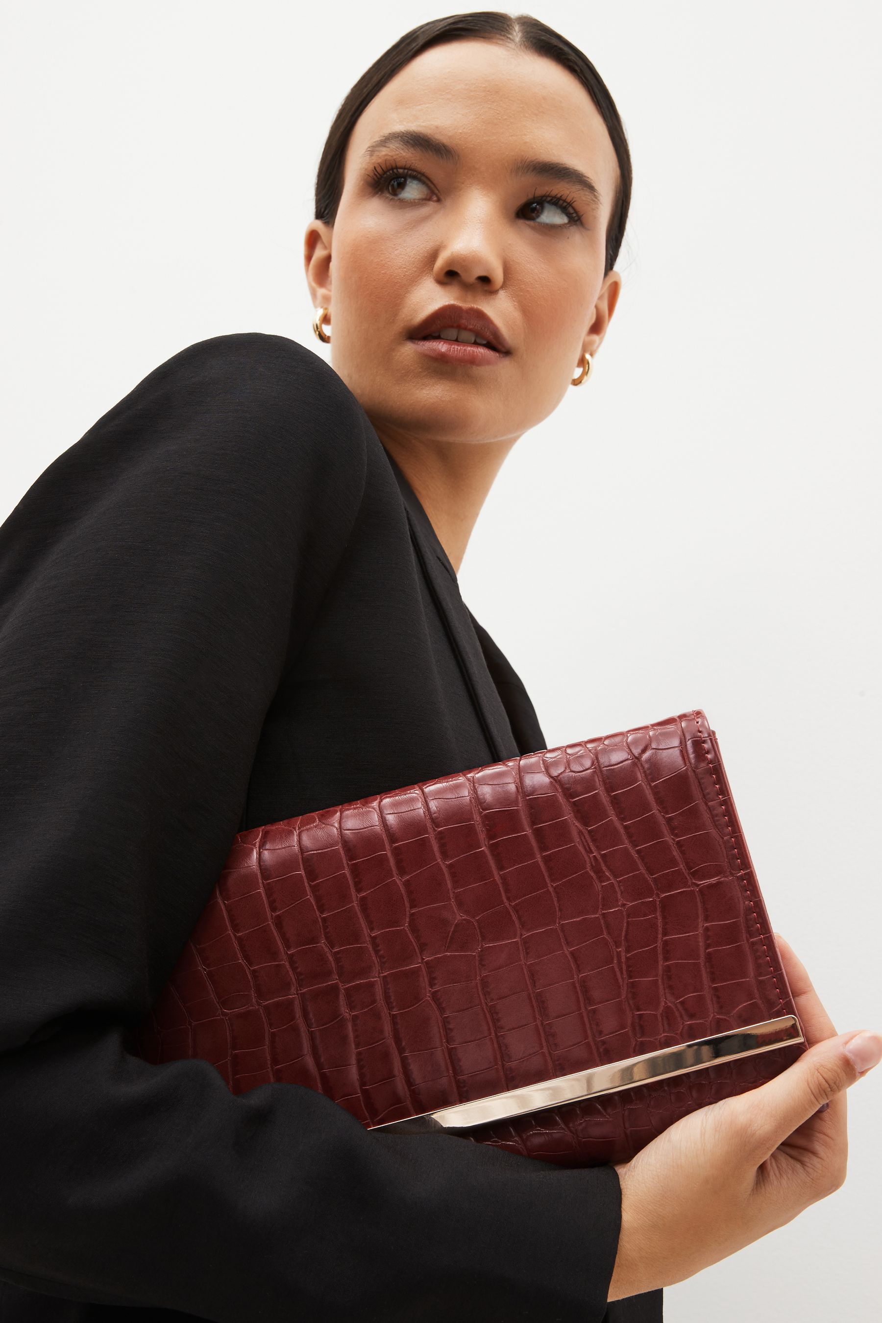 Red clutch bag with chain on sale