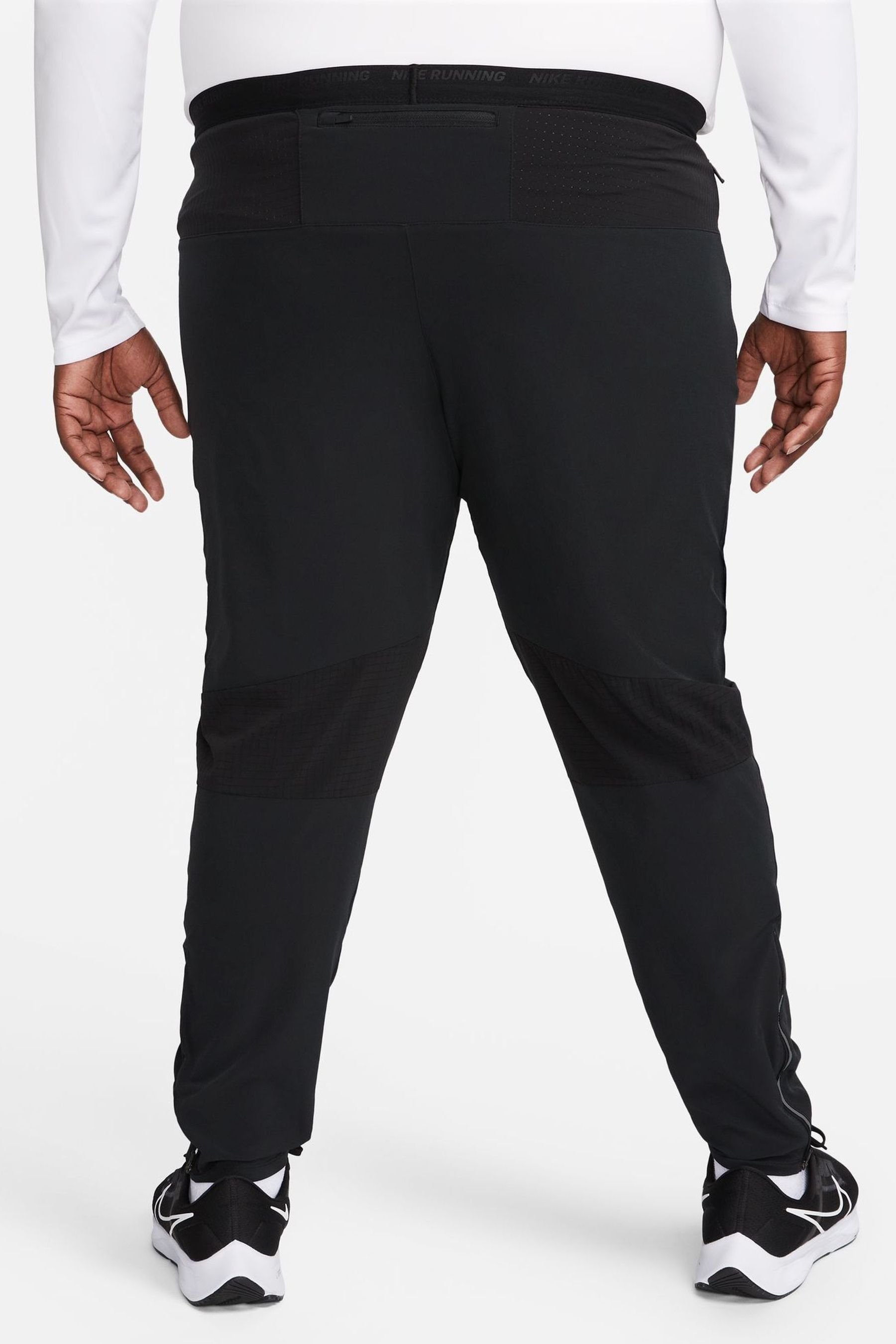 Nike running woven joggers in black hot sale