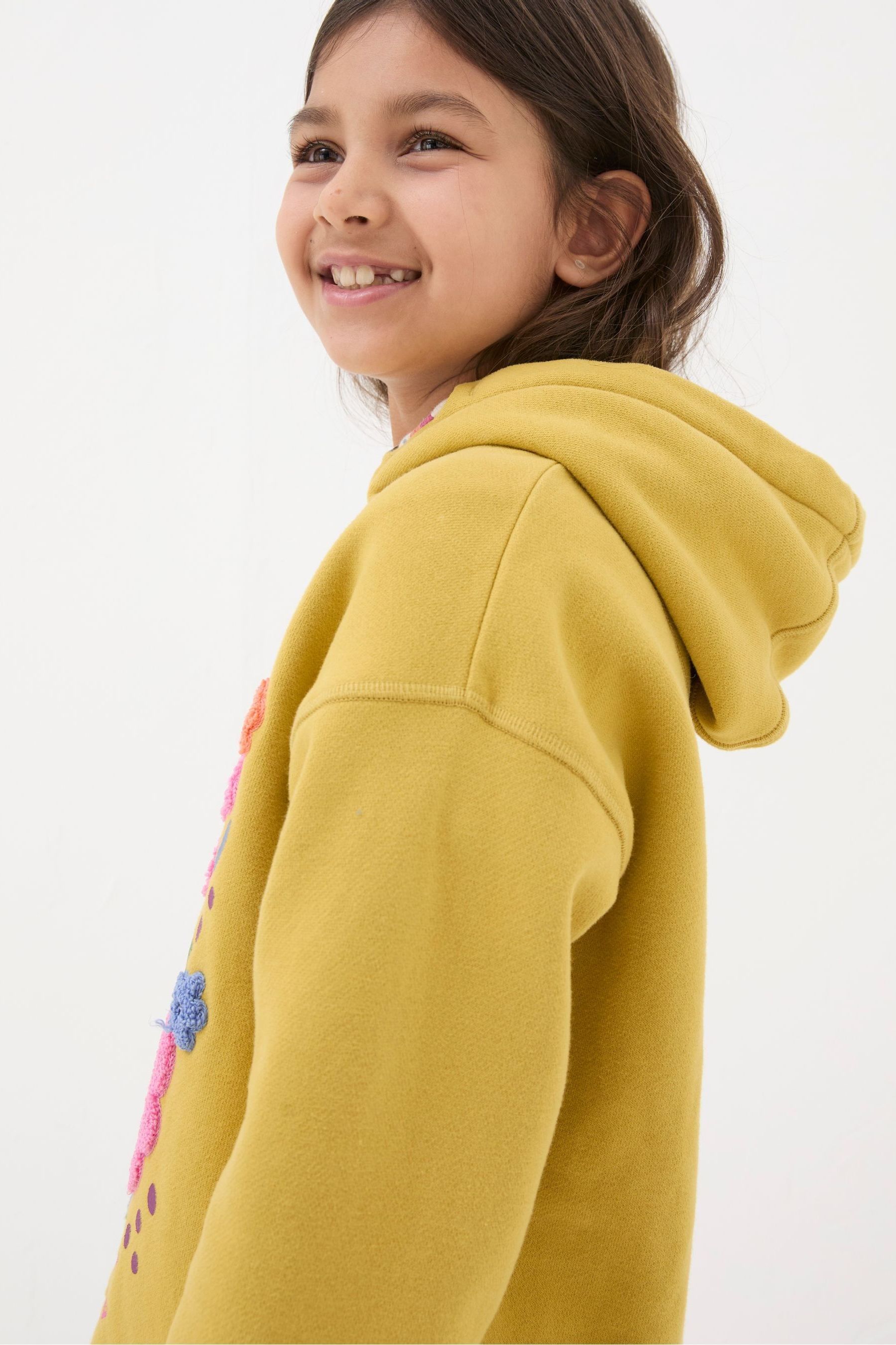 Yellow artist hoodie deals