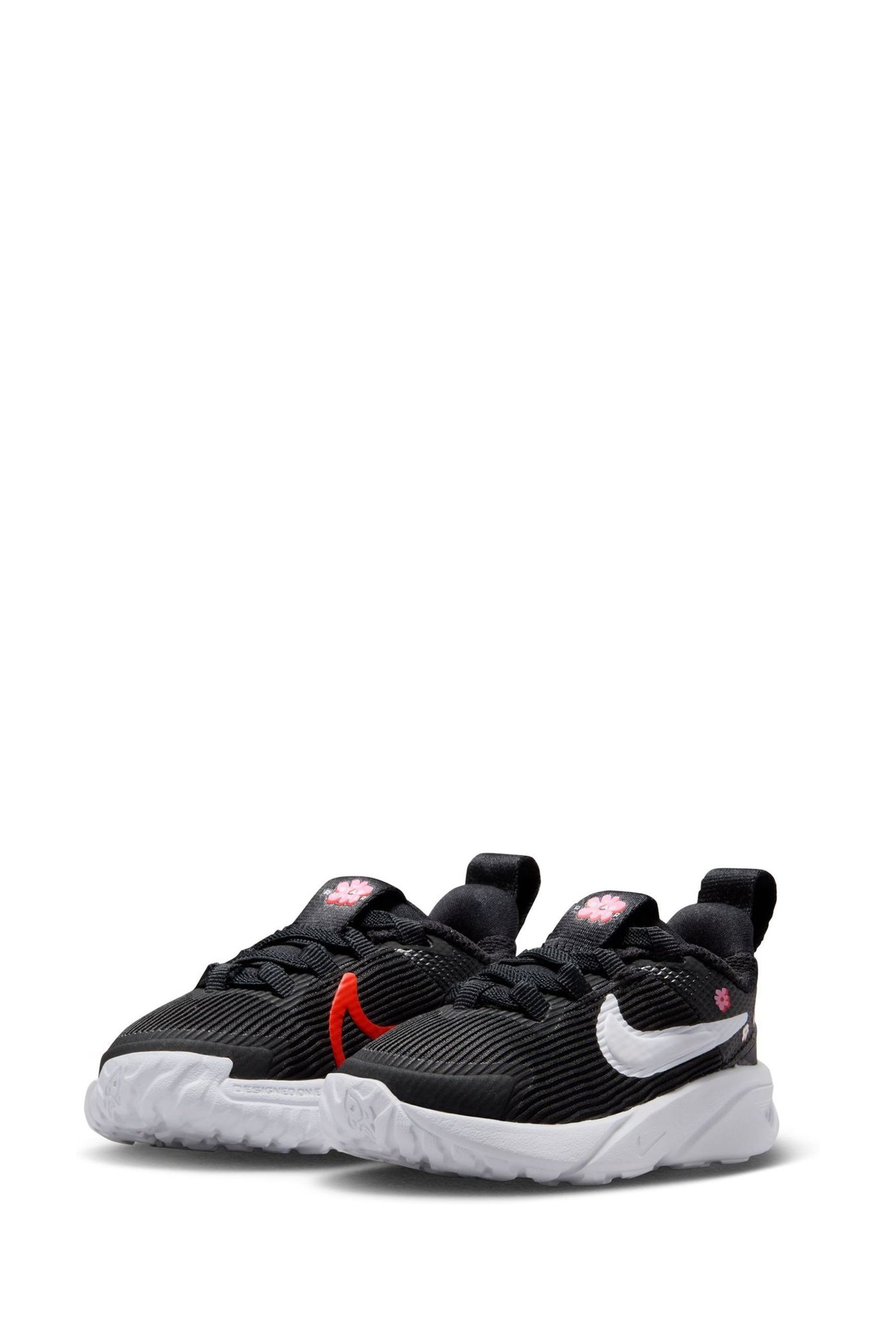 Nike black and floral shoes online