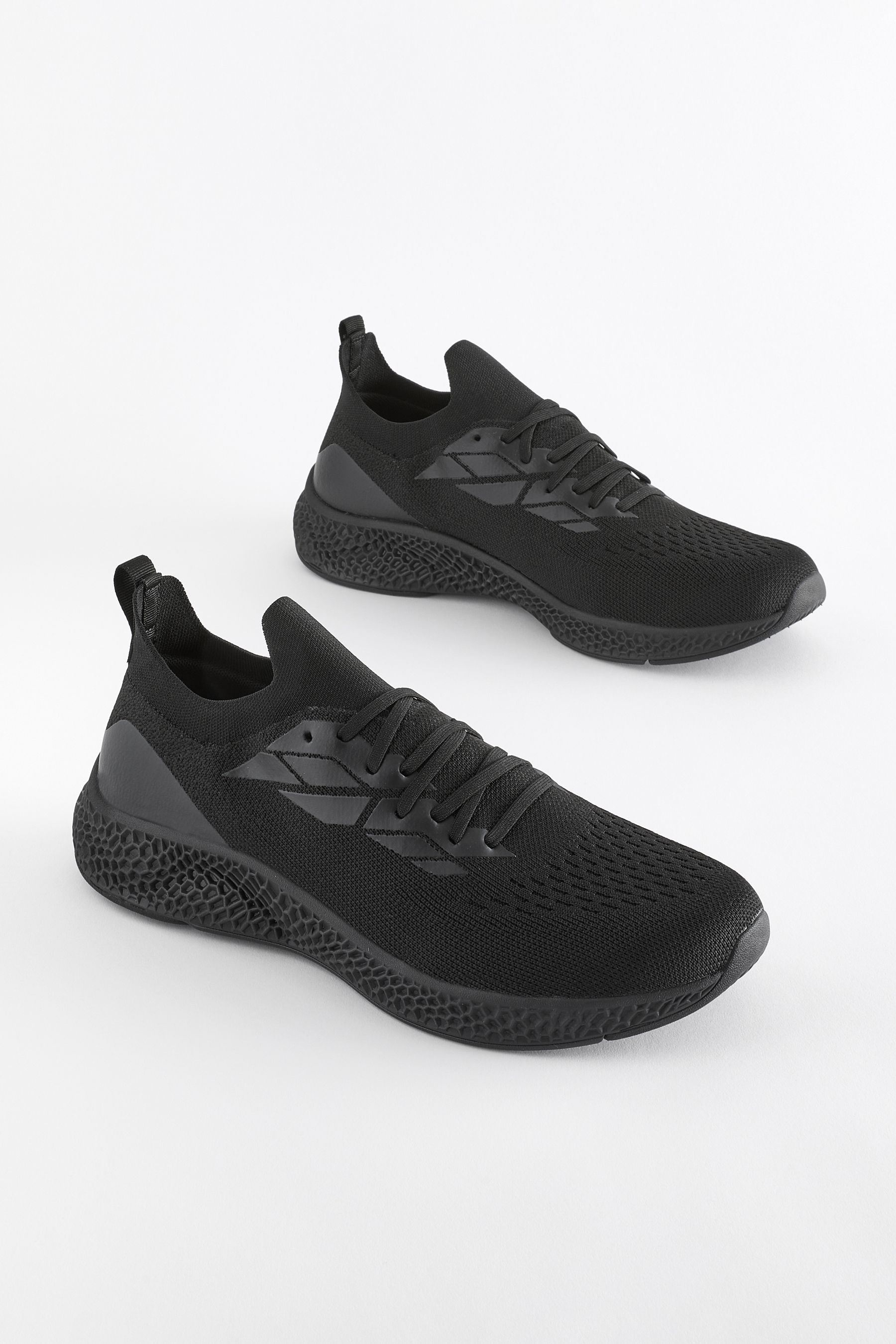 Knitted black trainers on sale
