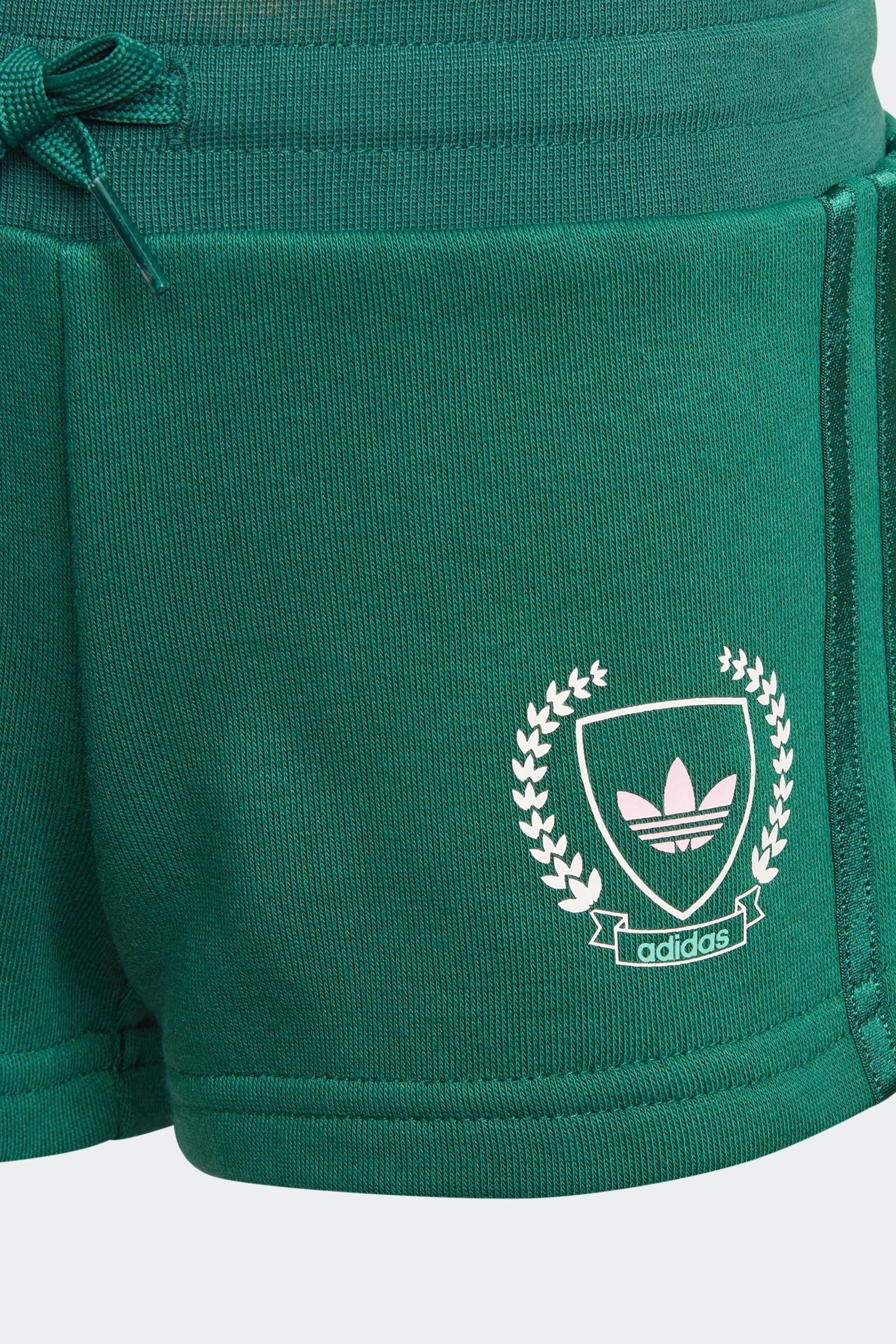 Green and white adidas shorts sale