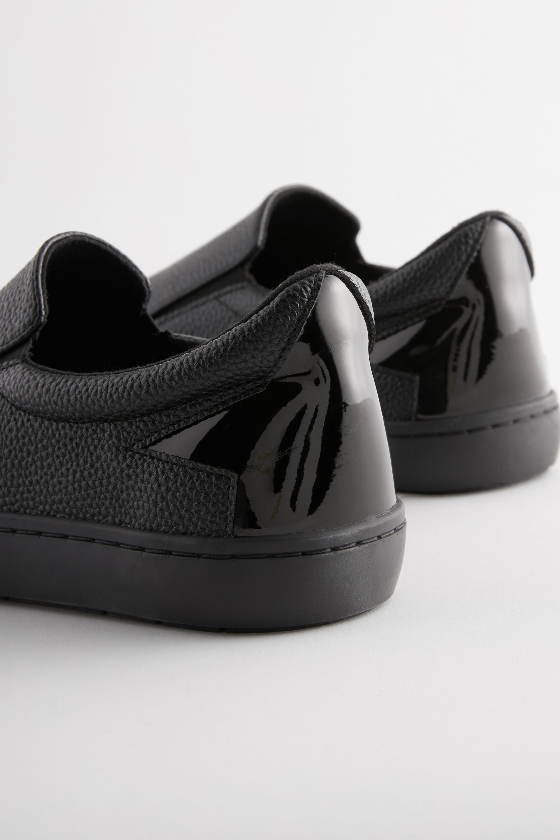 Black pull on trainers new arrivals