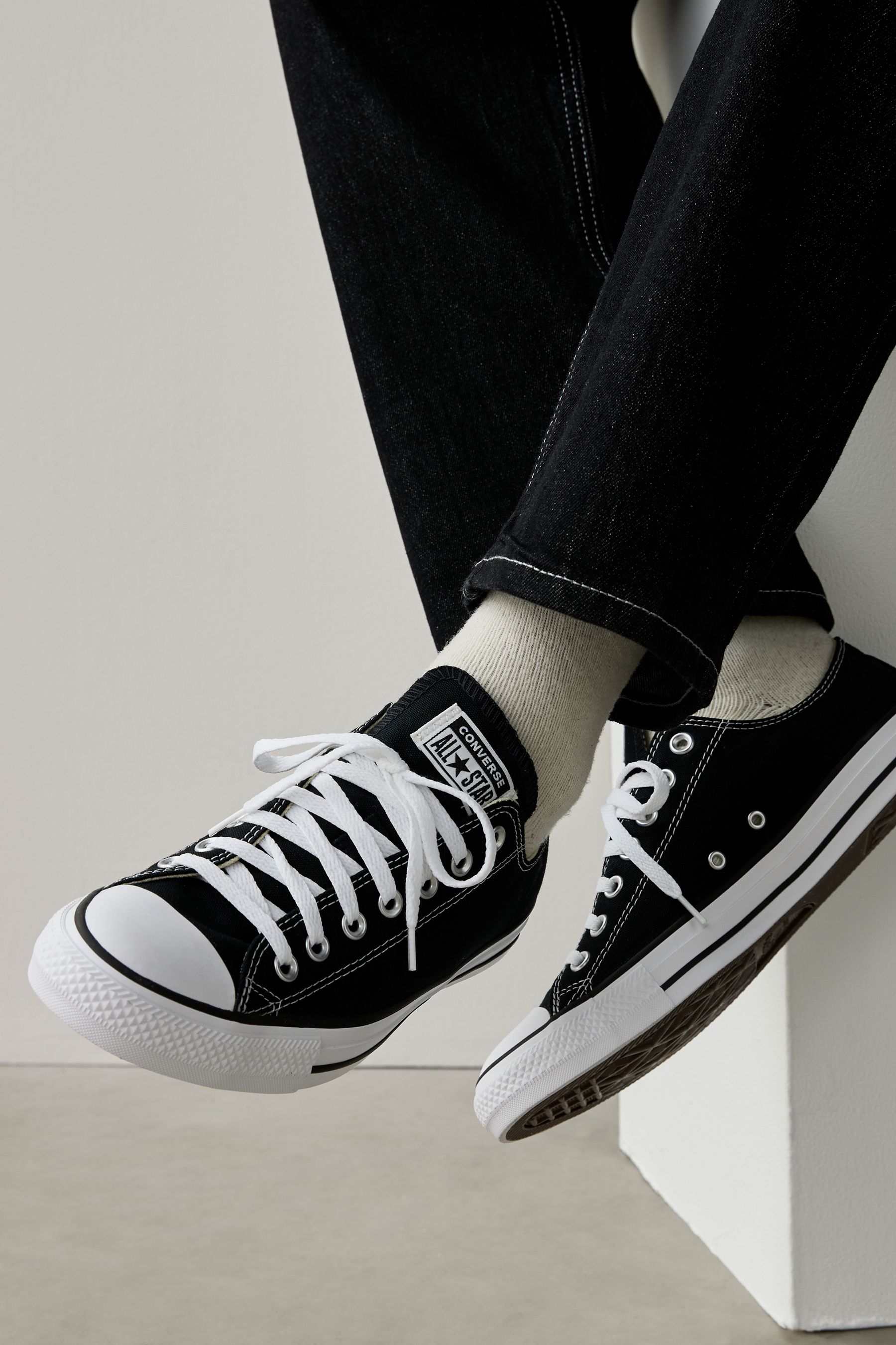 Converse black short sales