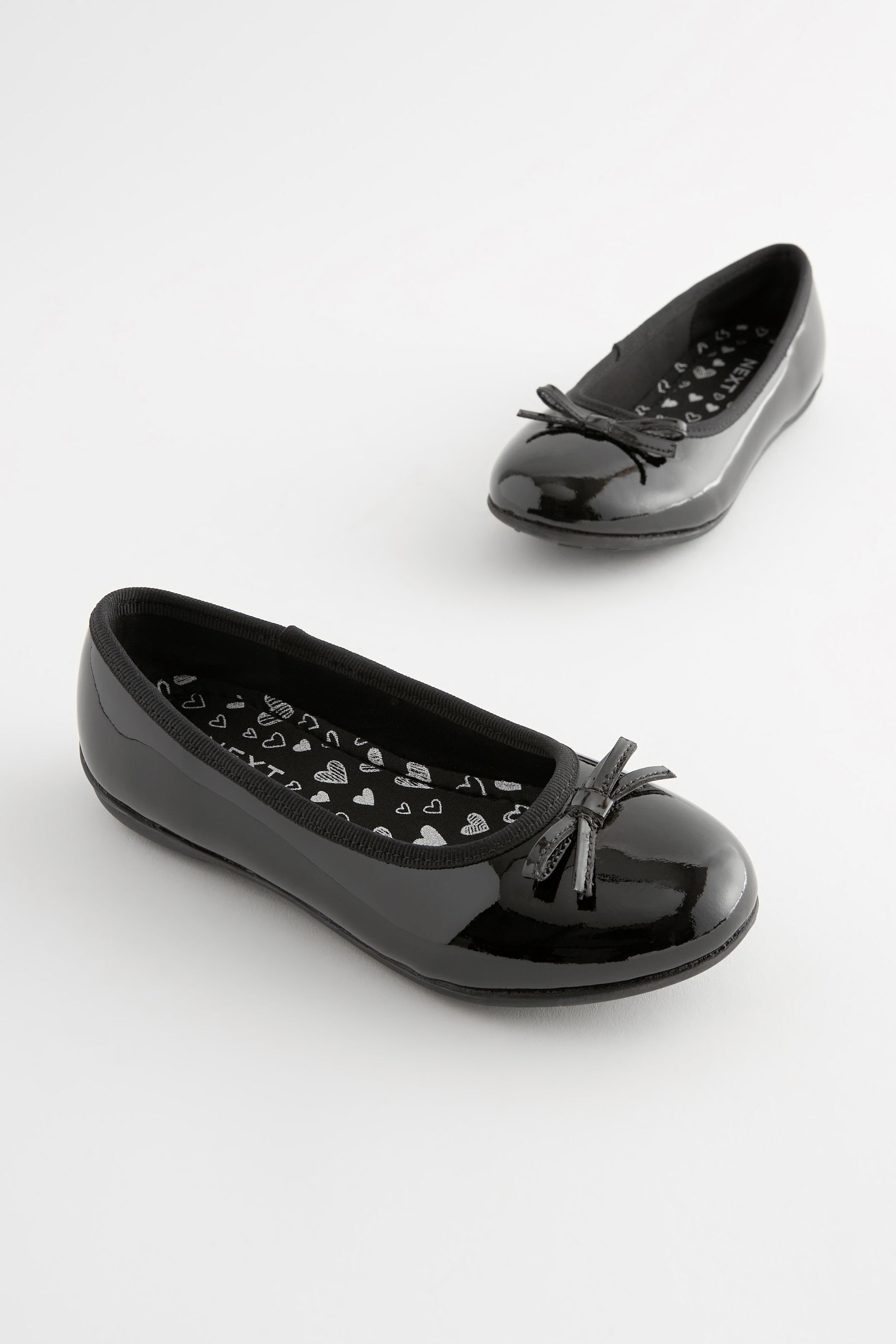 Black patent ballet shoes top