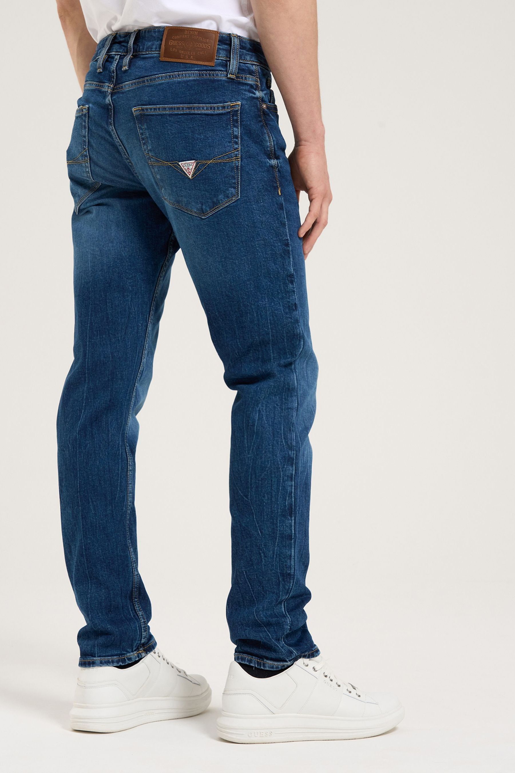 Buy Guess Blue Slim Tapered Jeans from Next Luxembourg