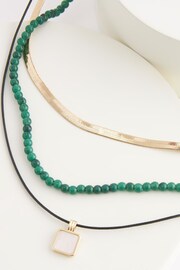 Gold Tone Recycled Metal Mutli Row Beaded And Cord Necklace - Image 4 of 5