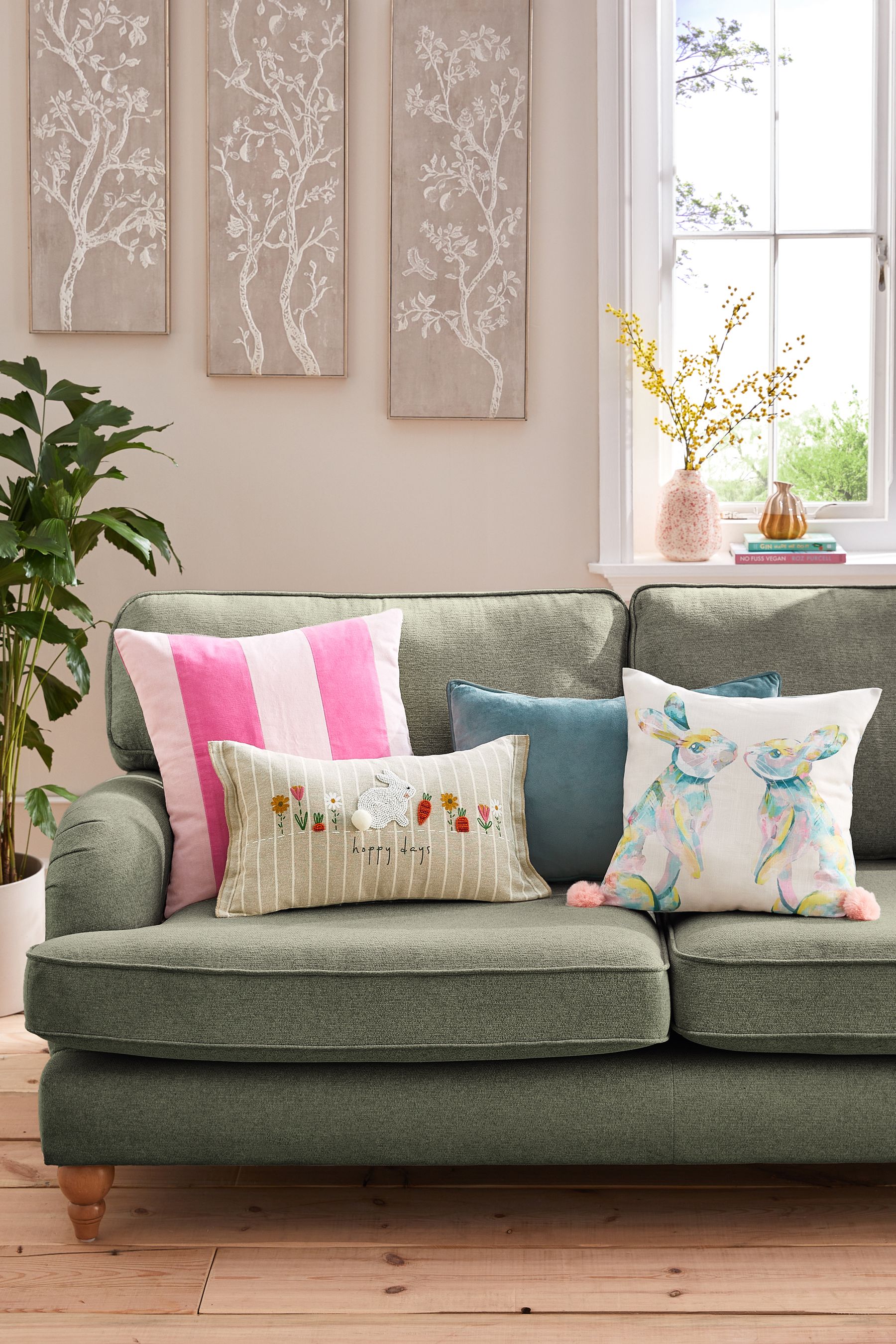 Pink and store white striped cushions