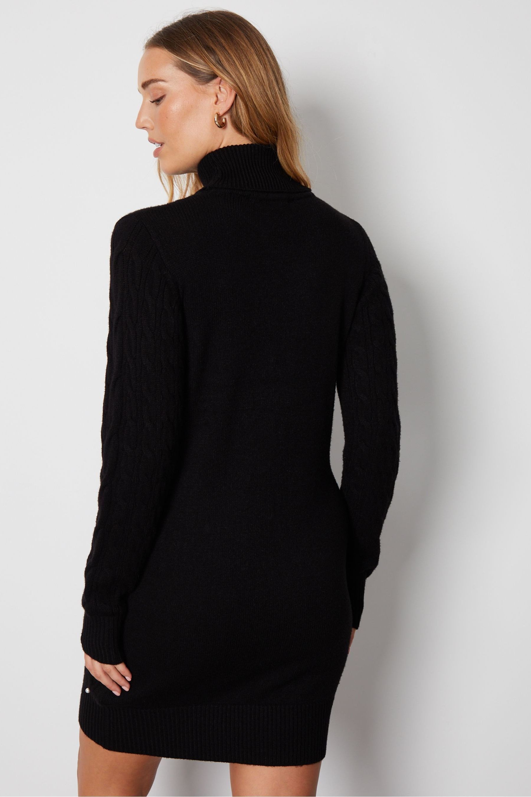 Black sweater shop dress with pearls
