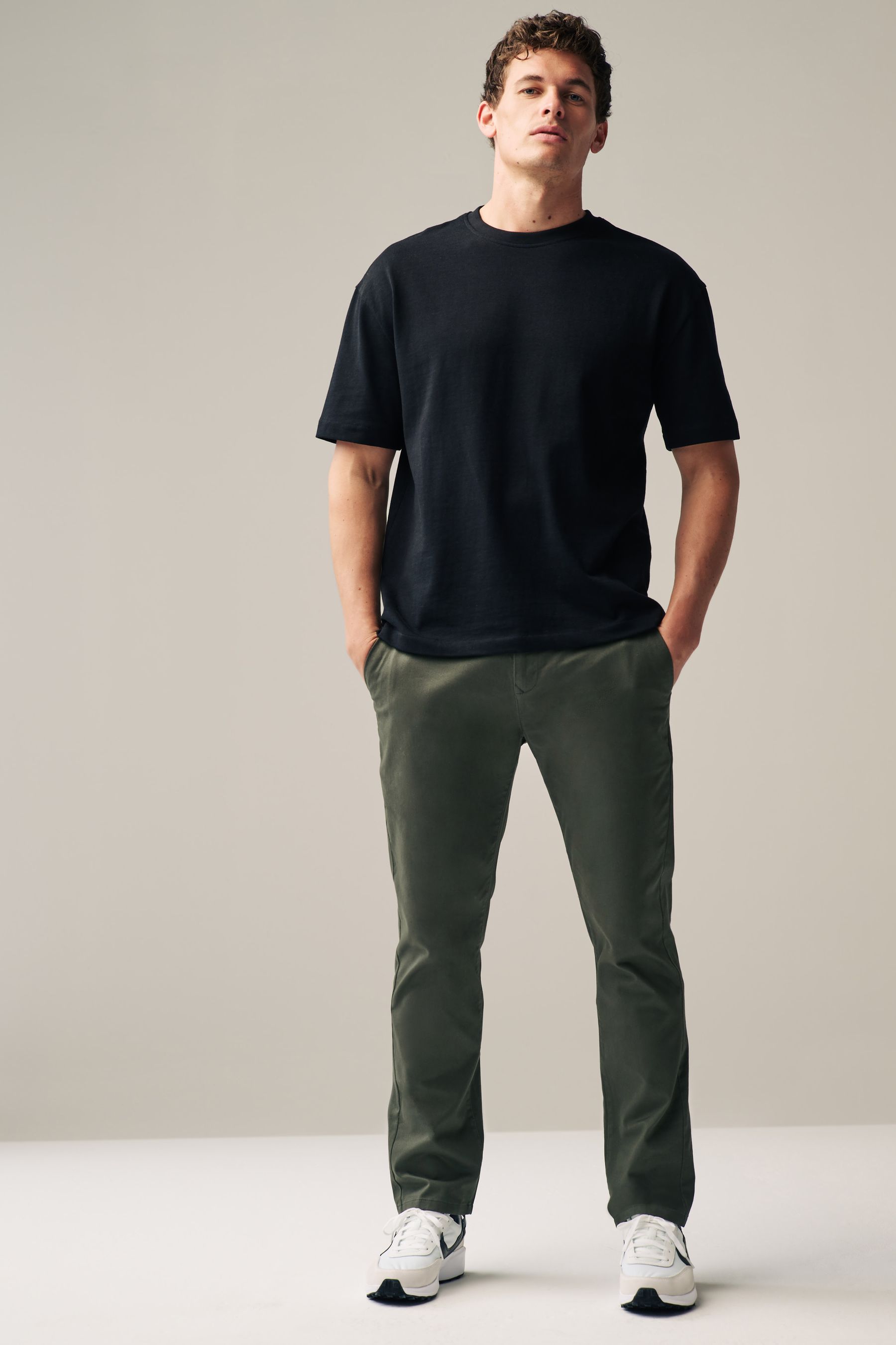 Green shop chino trousers