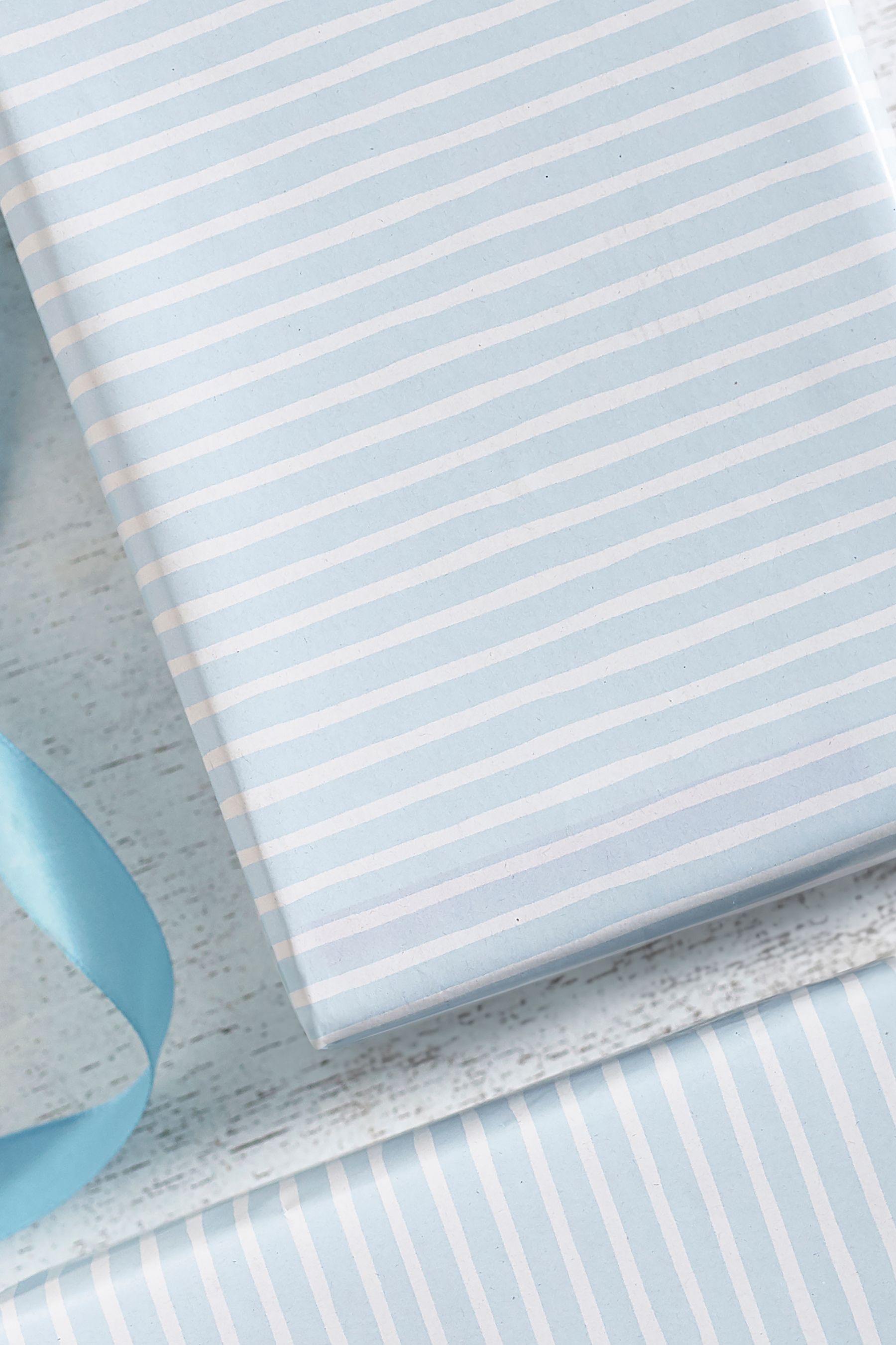 Light blue shop striped wrapping paper