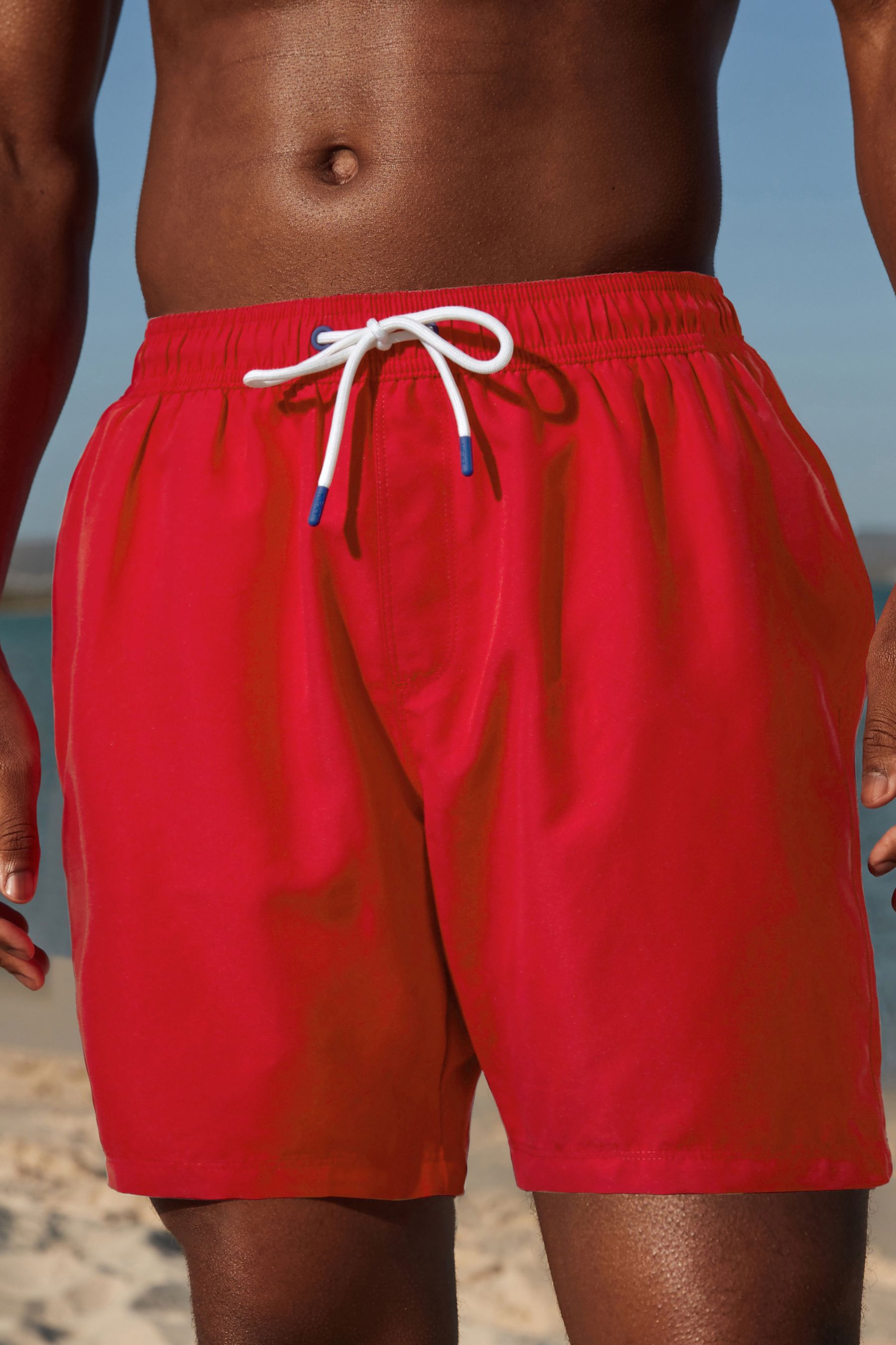 Red short swim trunks on sale