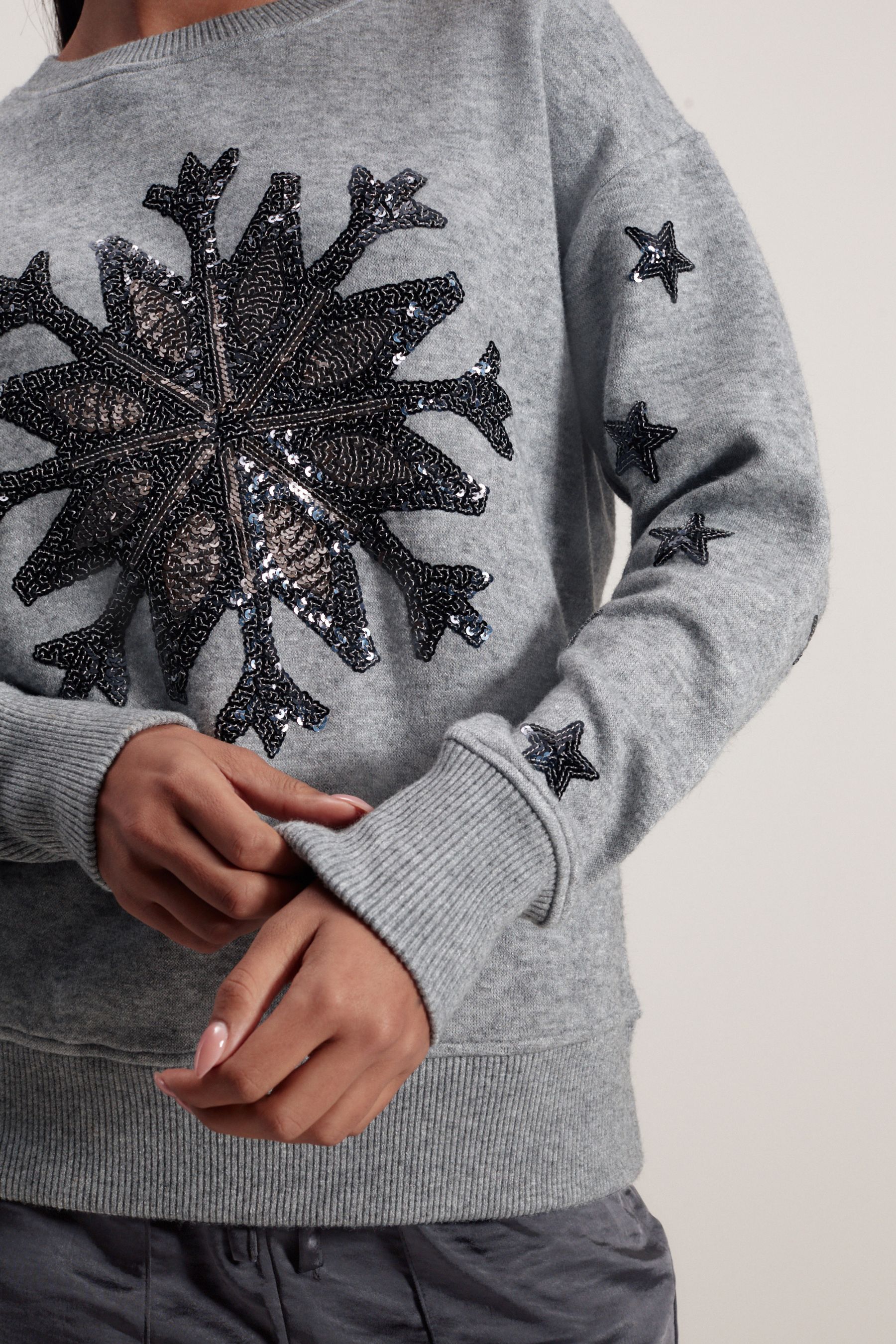 Grey snowflake jumper discount