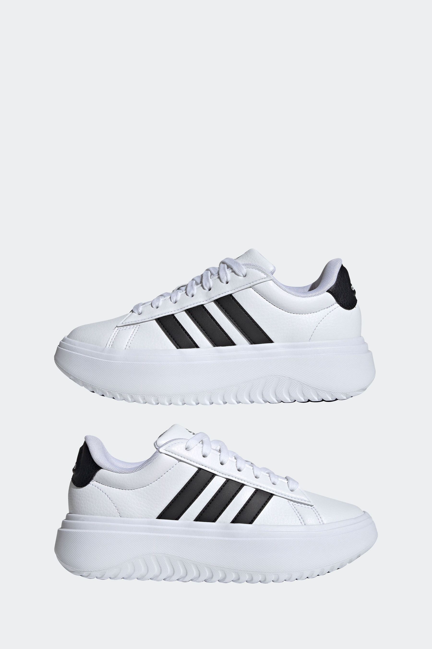 White adidas trainers with black stripes online