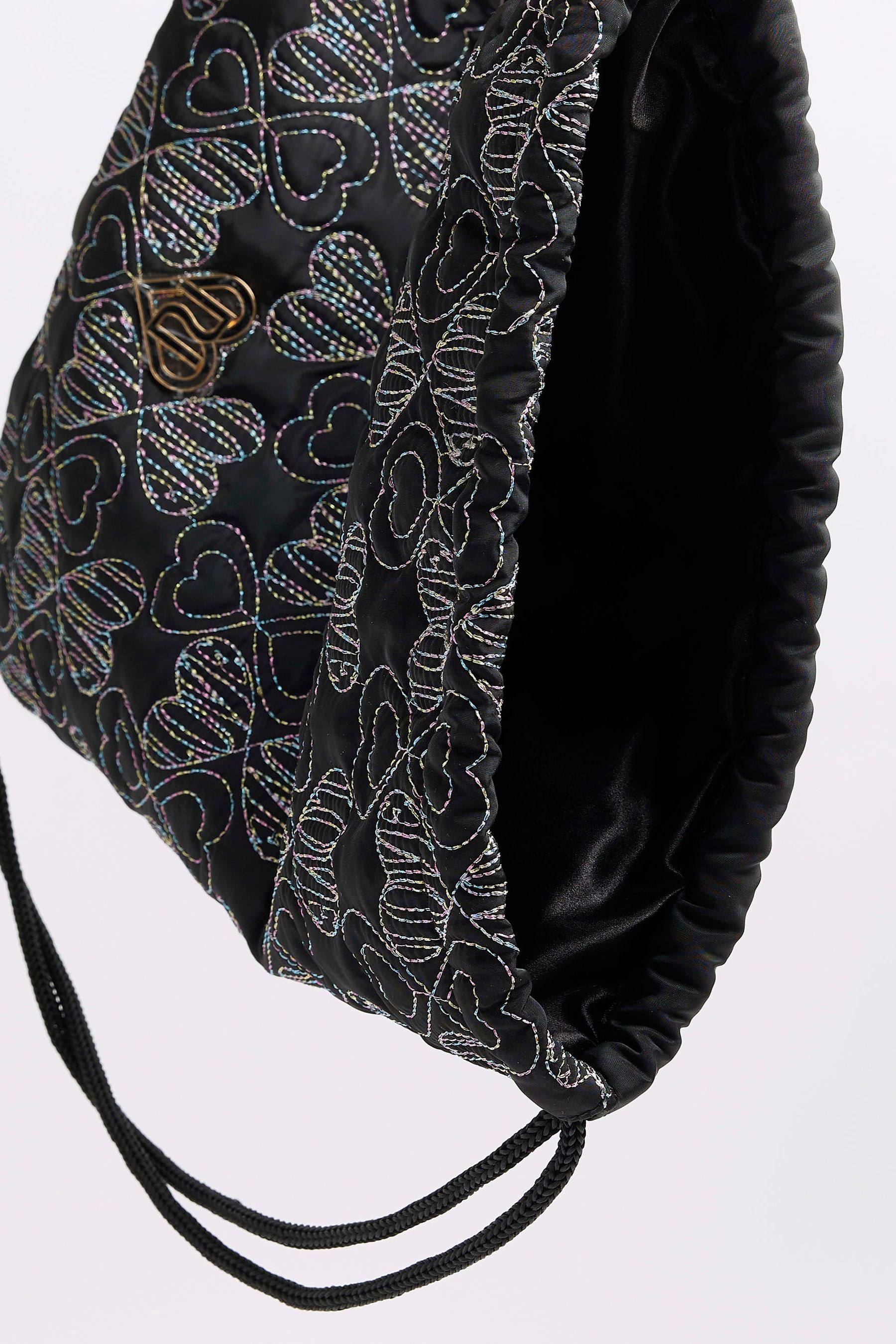 Buy River Island Black Girls Nylon Heart Quilt Drawstring Backpack from Next Luxembourg